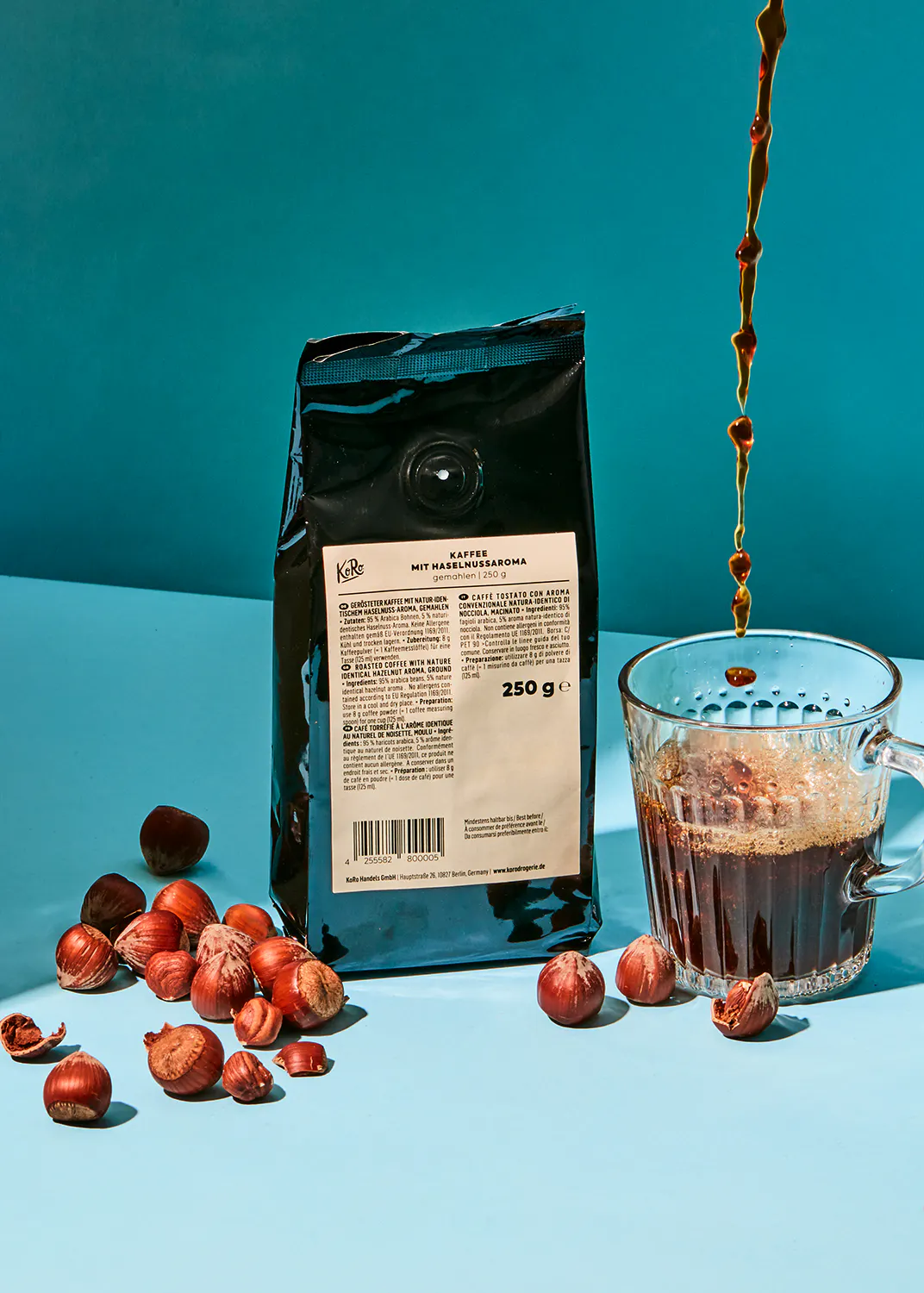 a bag of kaffee mit haselnussroma sits next to a cup of coffee