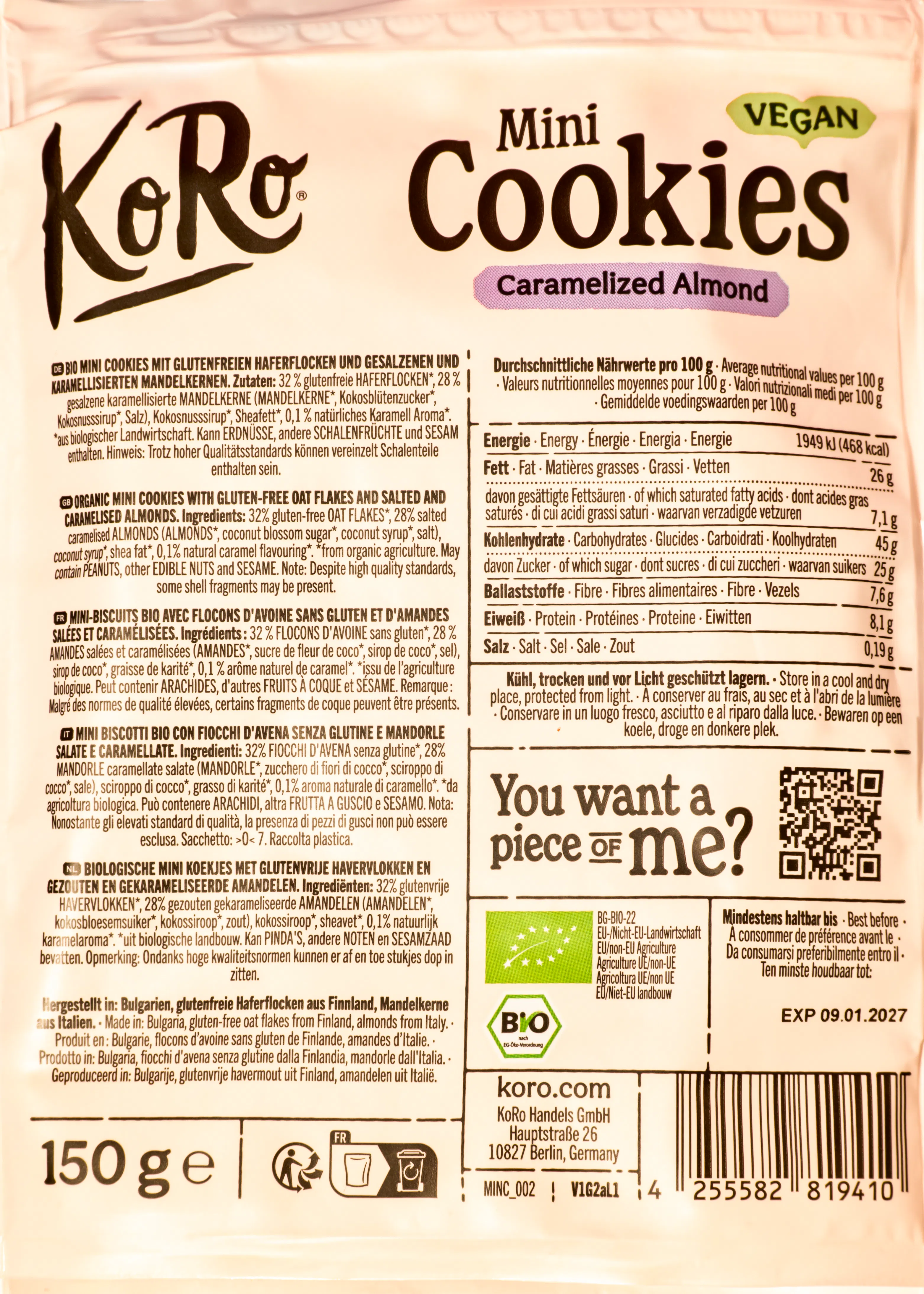 eine verpackung von koro mini cookies mit karamellisierten mandeln und glutenfreien haferflocken, gekennzeichnet als vegan und bio, mit einem gewicht von 150 gramm.