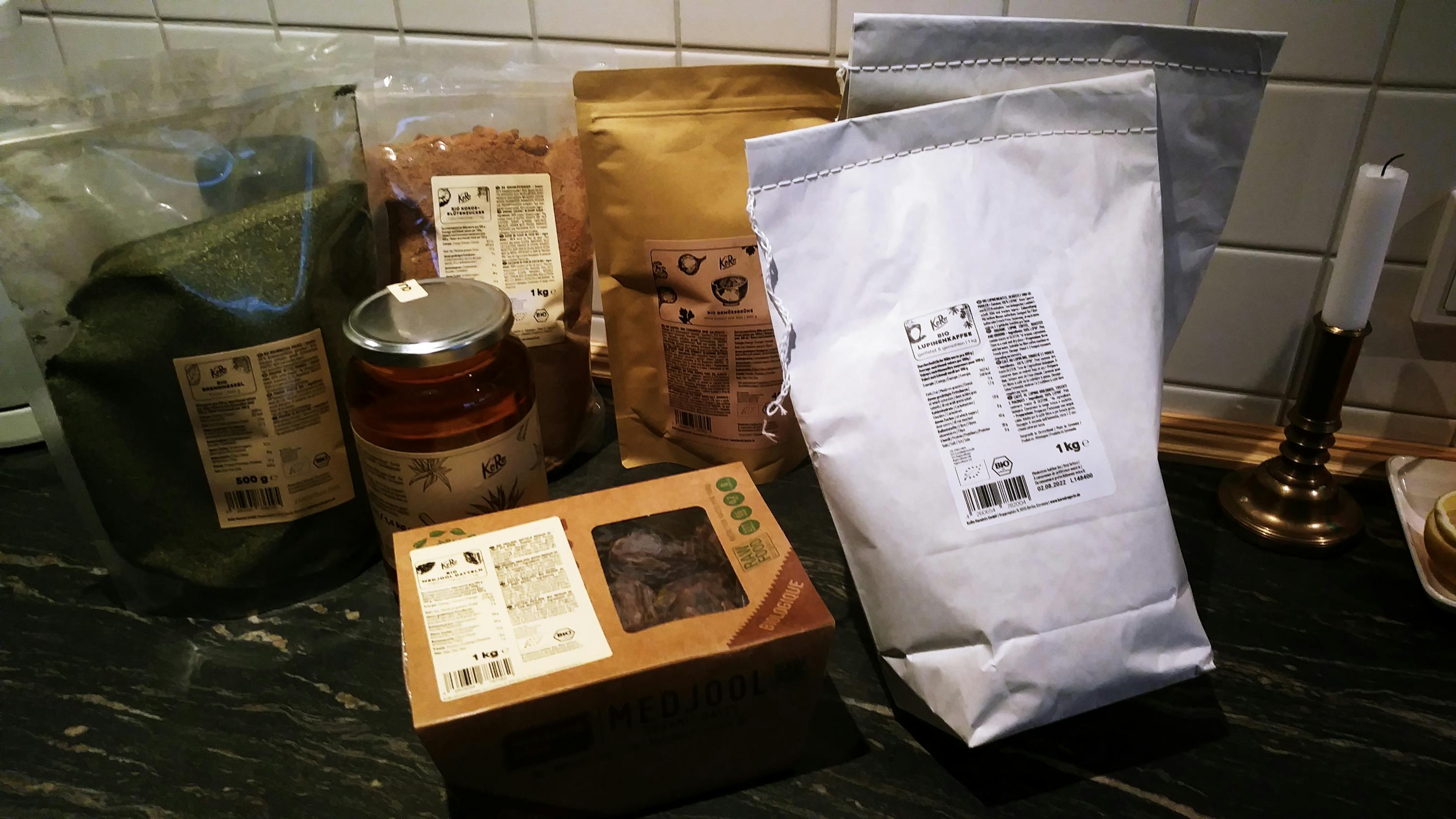 a box that says ' herbal ' on it sits next to a bag