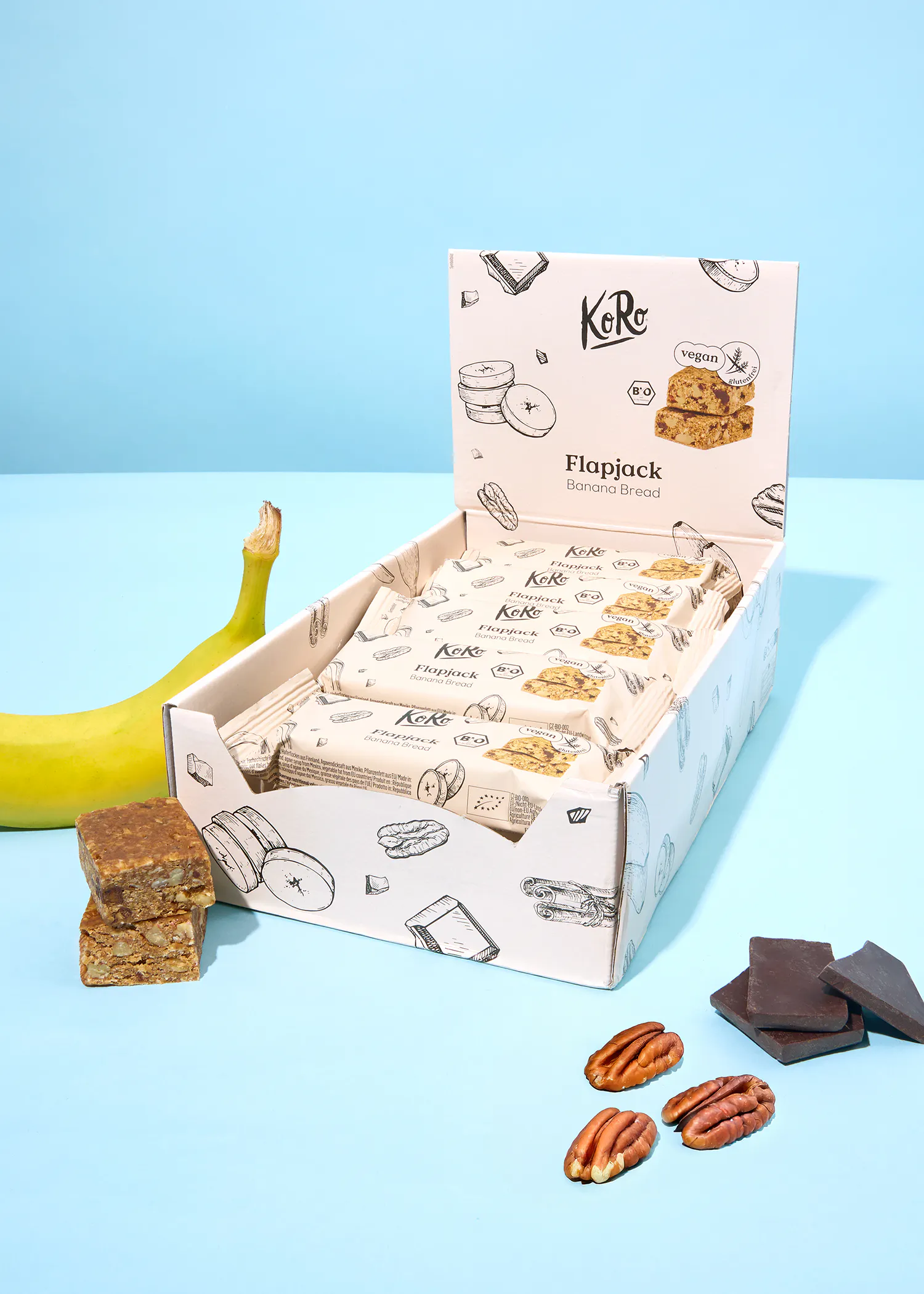 eine Schachtel Kekse mit Bananenbrot steht auf einem Tisch