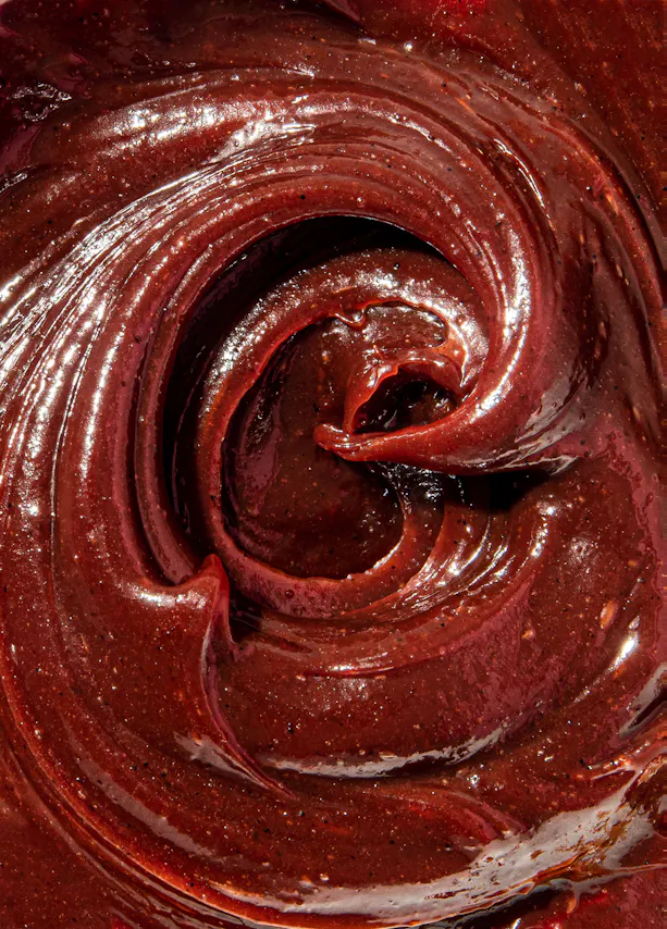 eine Nahaufnahme einer Schokoladencreme mit einer Swirlstruktur