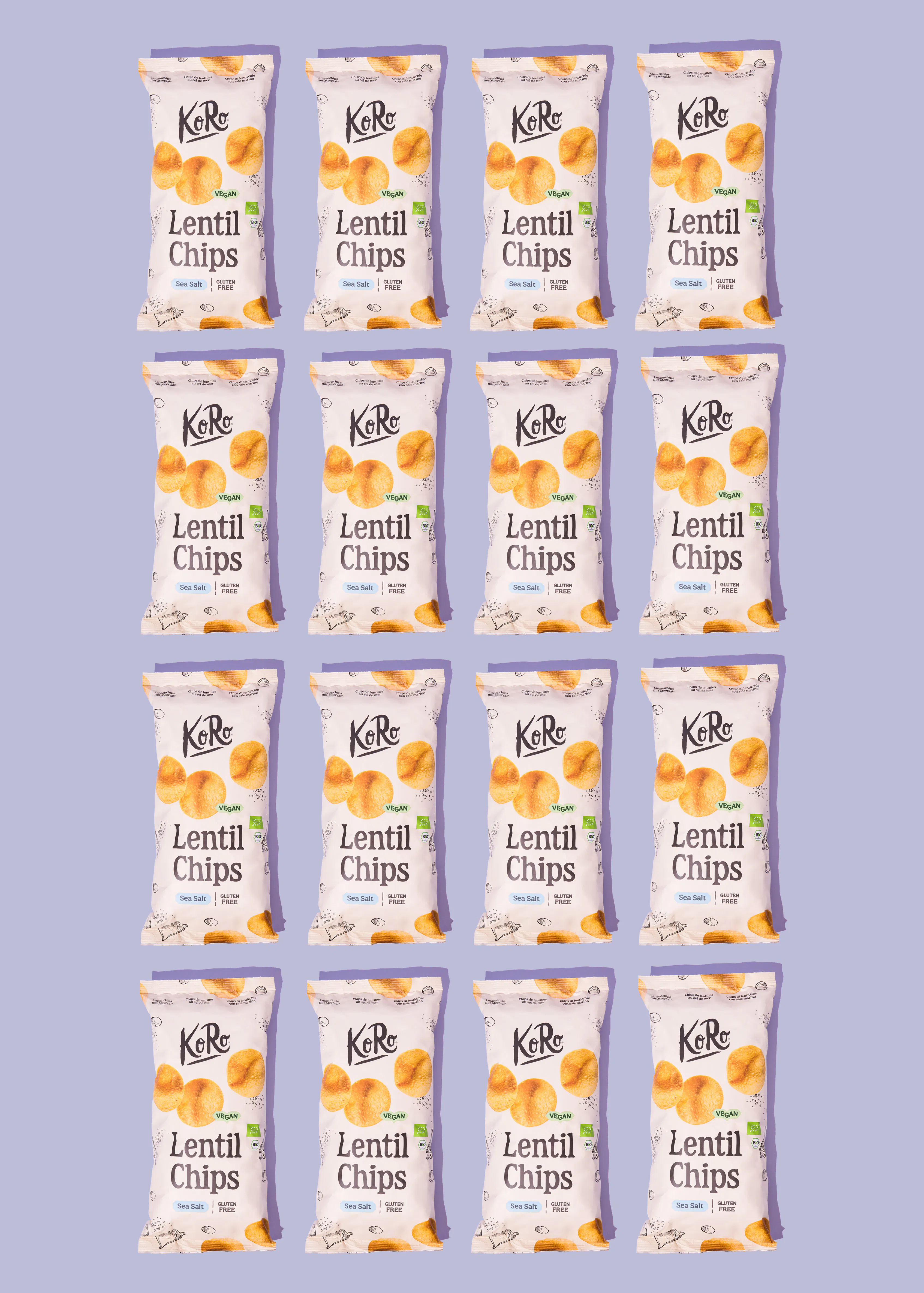 seize paquets de chips aux lentilles koro au sel marin disposés en grille sur un fond violet.