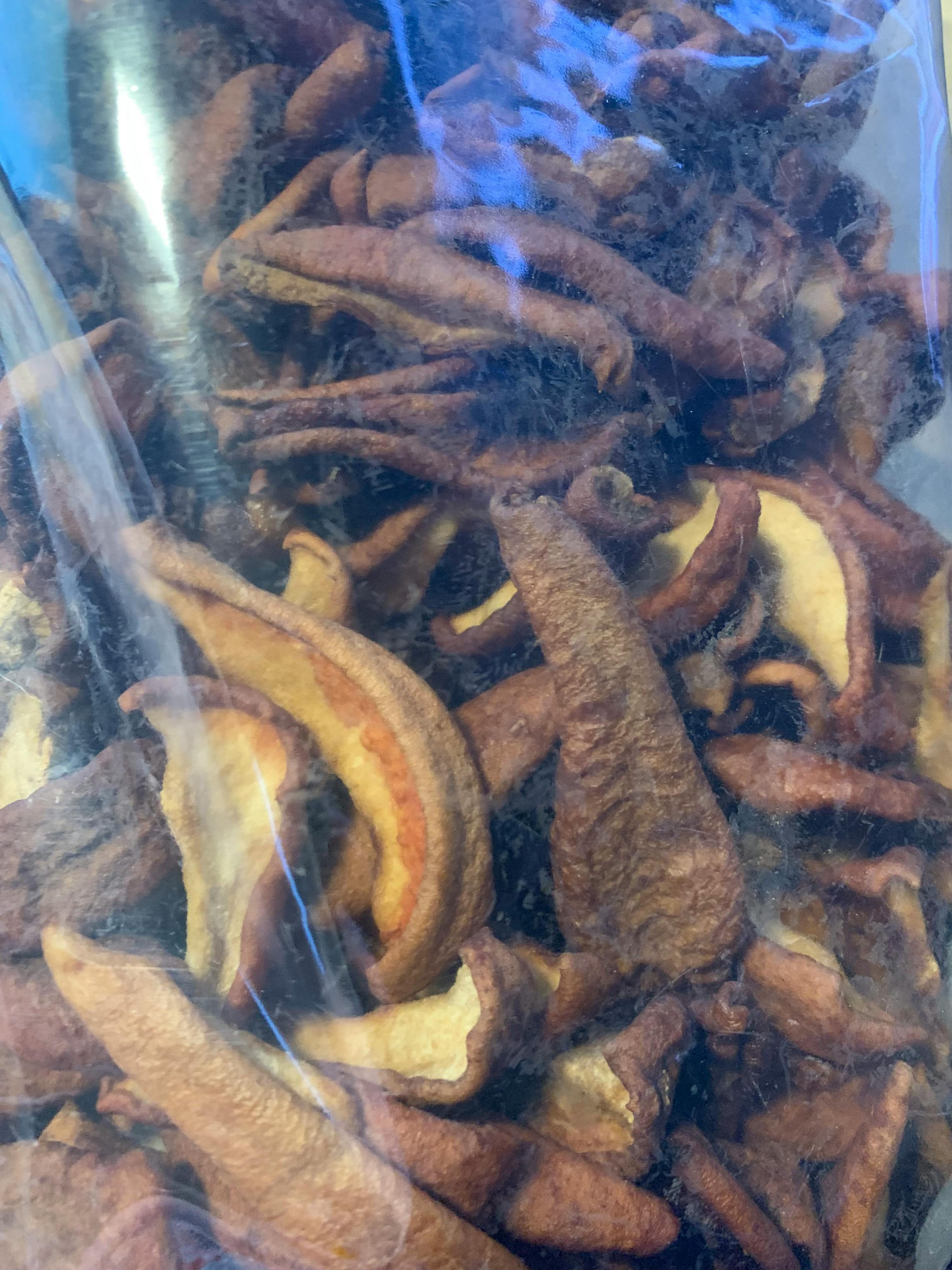 a close up of a bag of dried apple slices