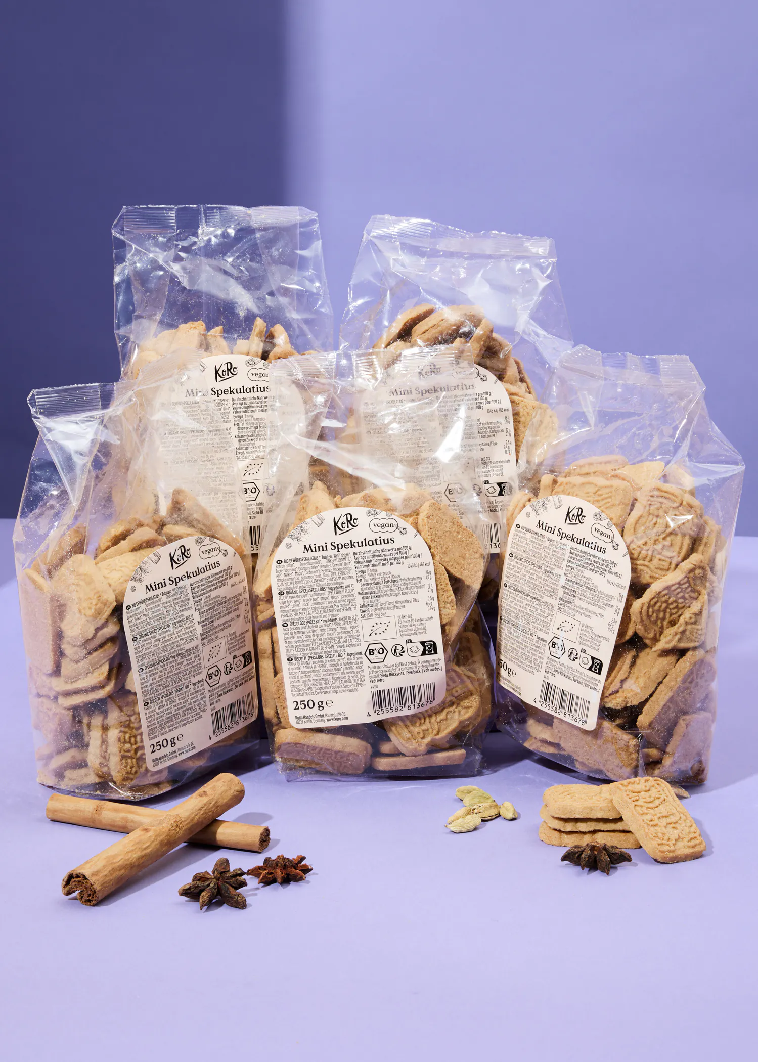 four bags of mini speculoos sit on a table