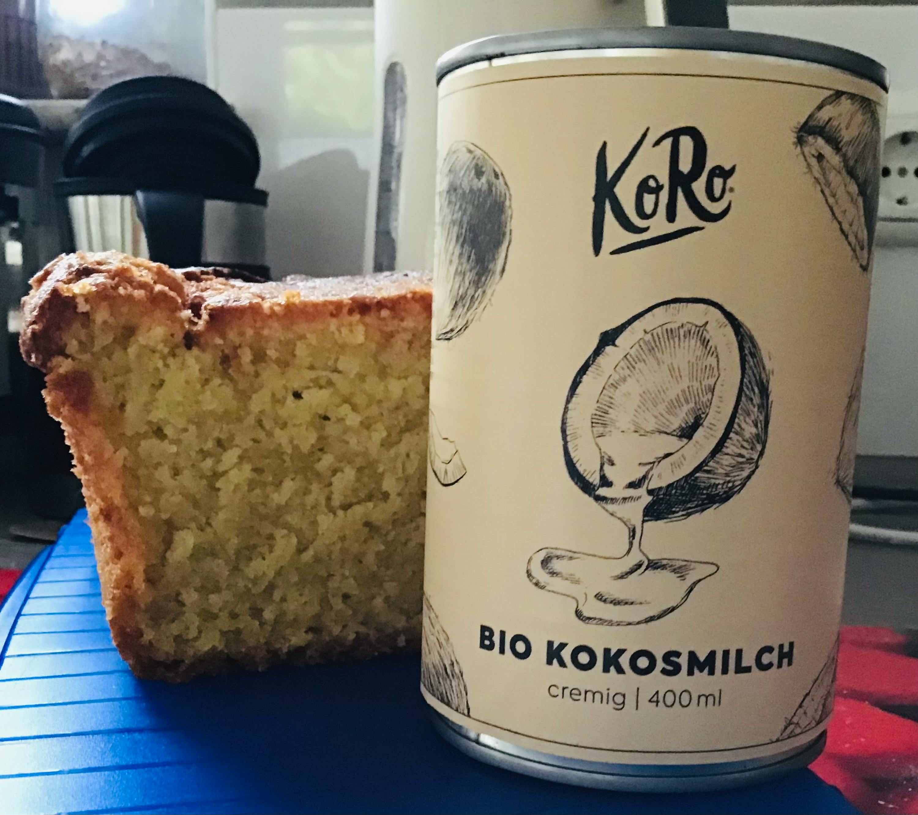 a slice of cake sits next to a can of bio kokosmilch