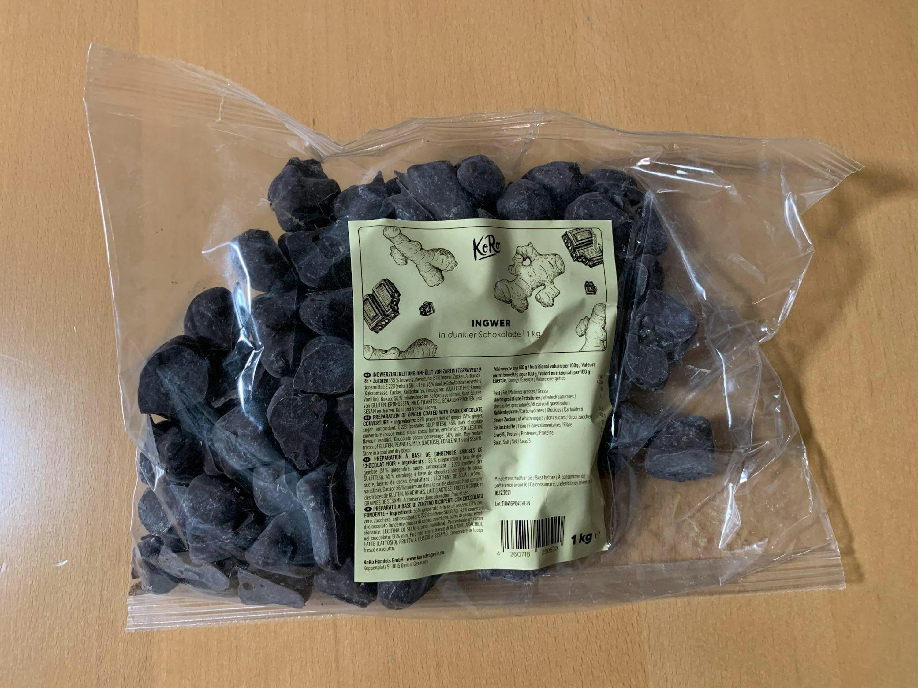 a bag of ginger is sitting on a wooden table