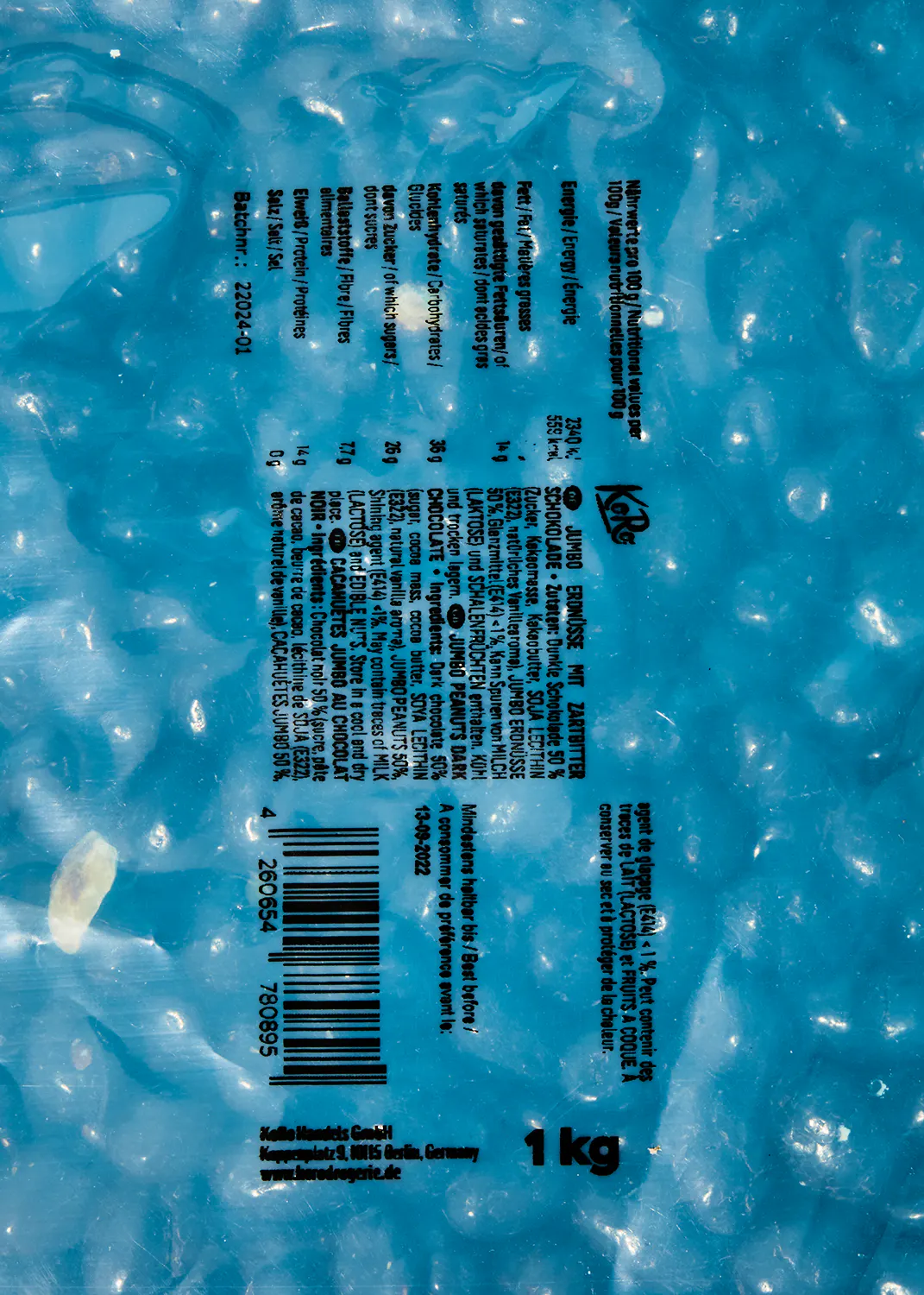 a blue plastic bag with a label that says 1 kg