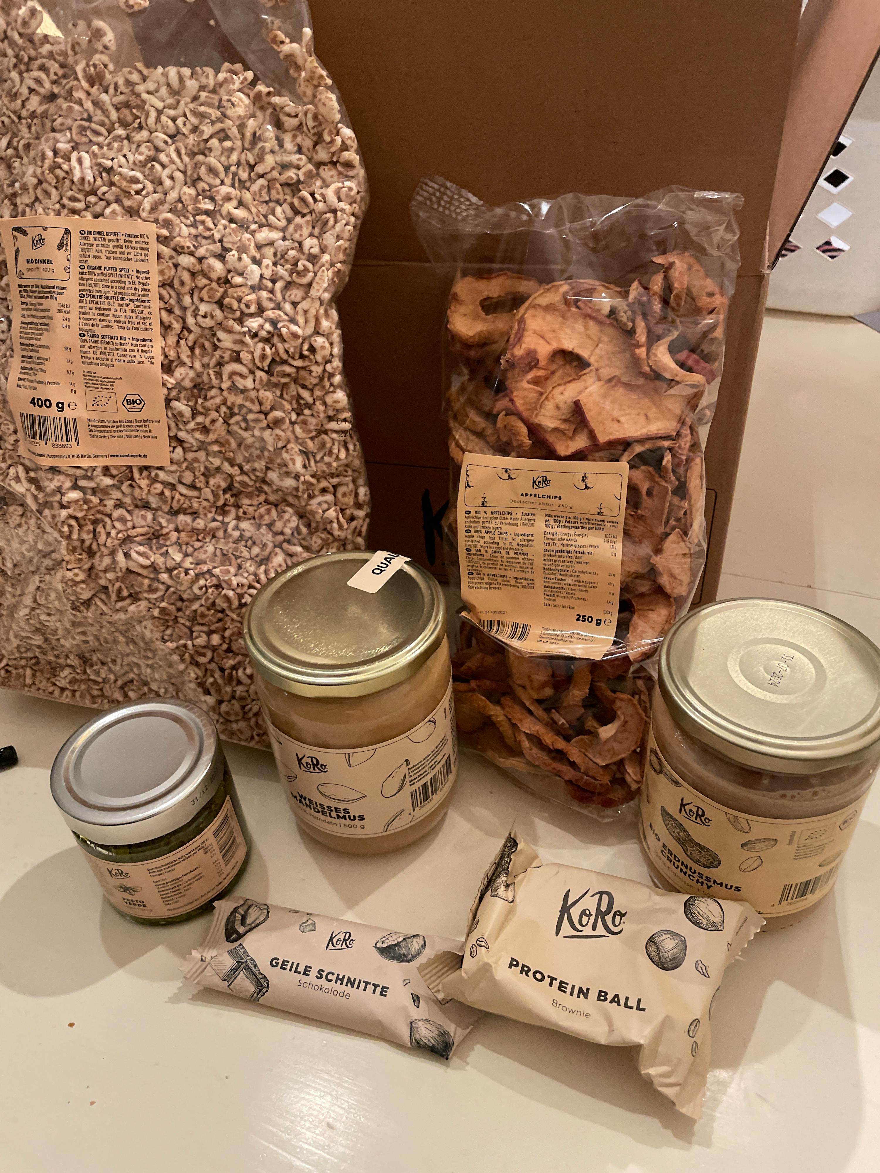 a box full of food including a protein ball