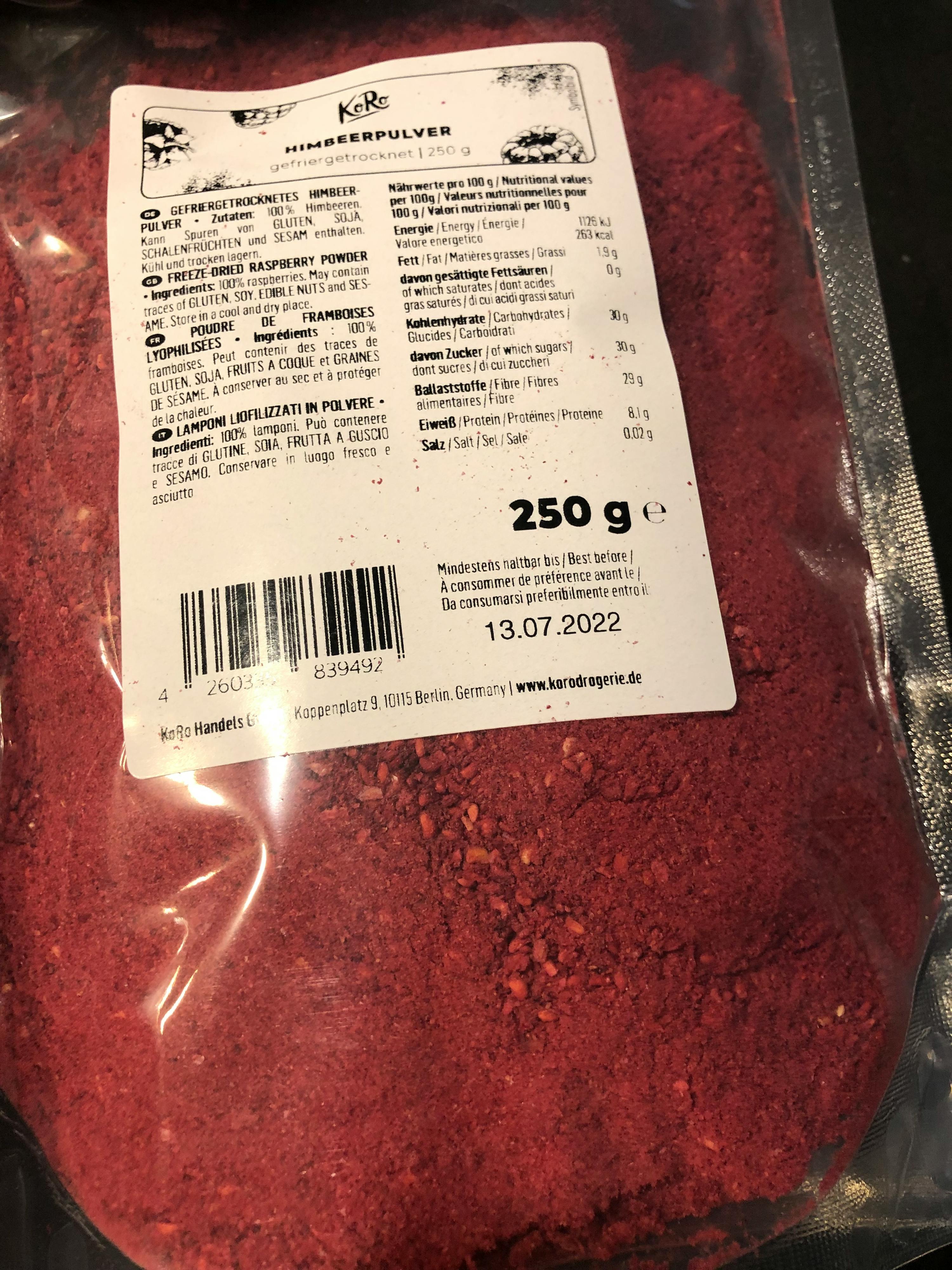 a bag of red powder has a label that says 250g