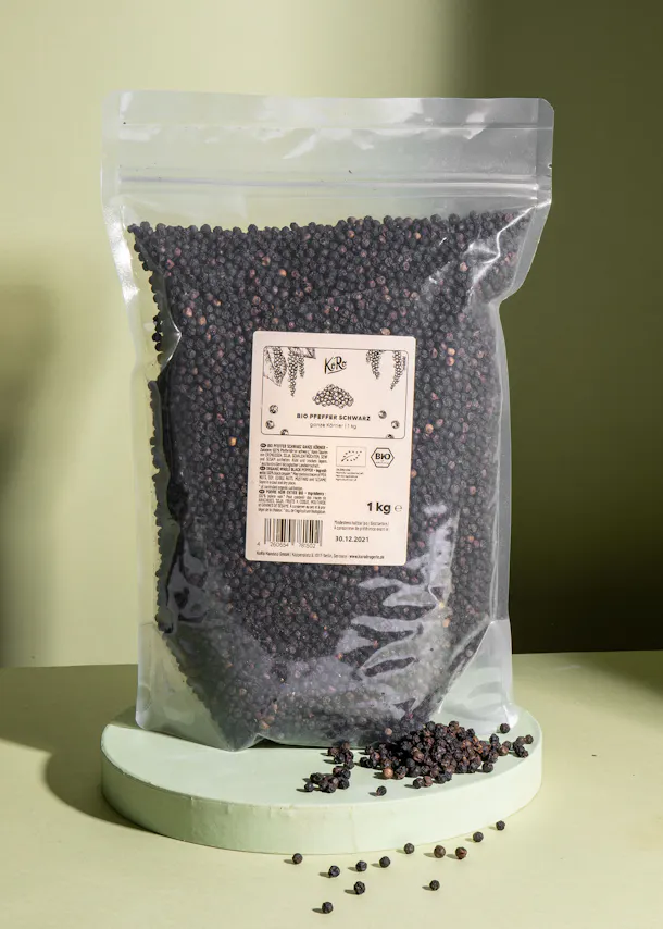 a bag of black pepper is sitting on a table