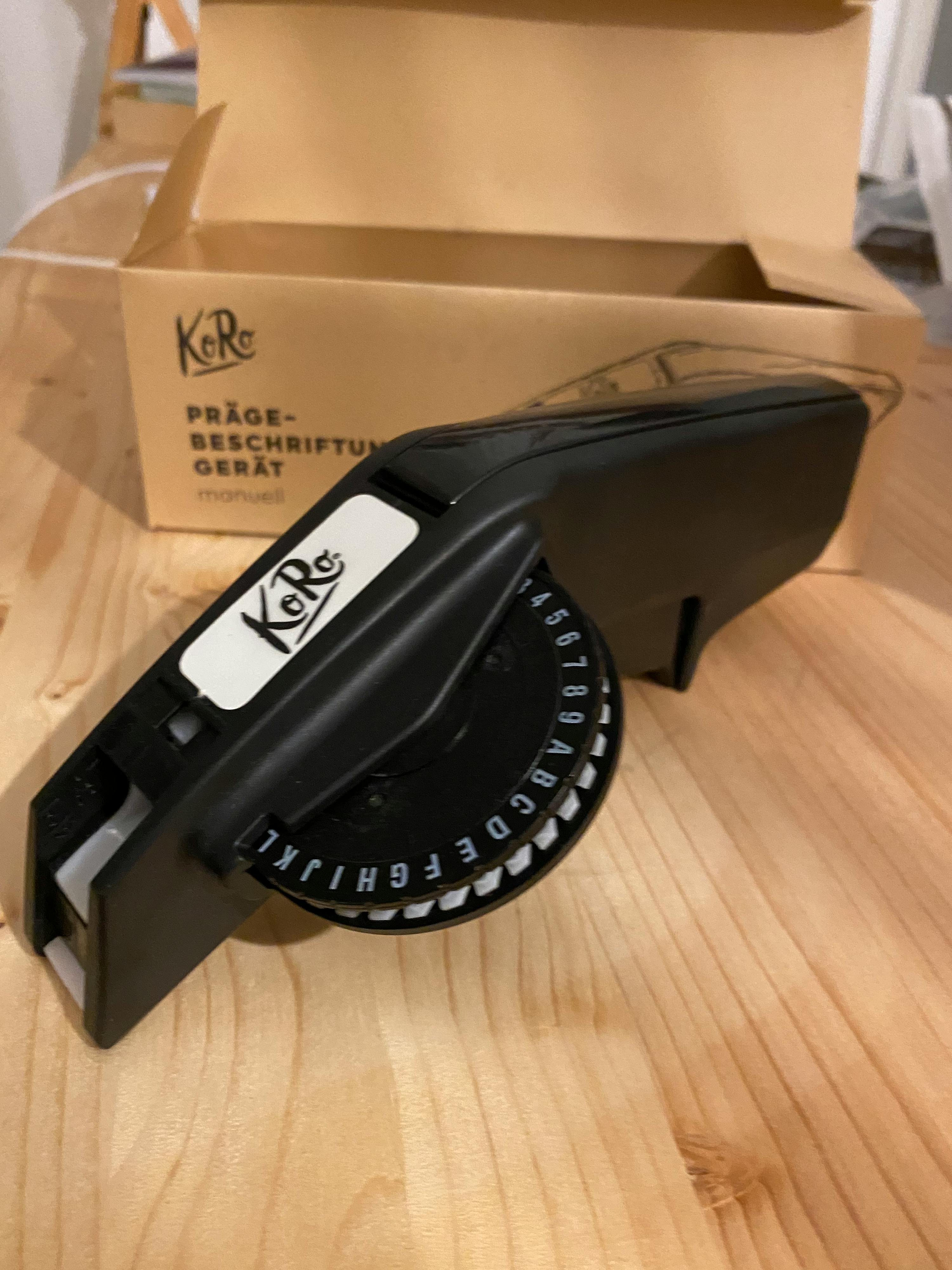 a black item that has the letter k on it