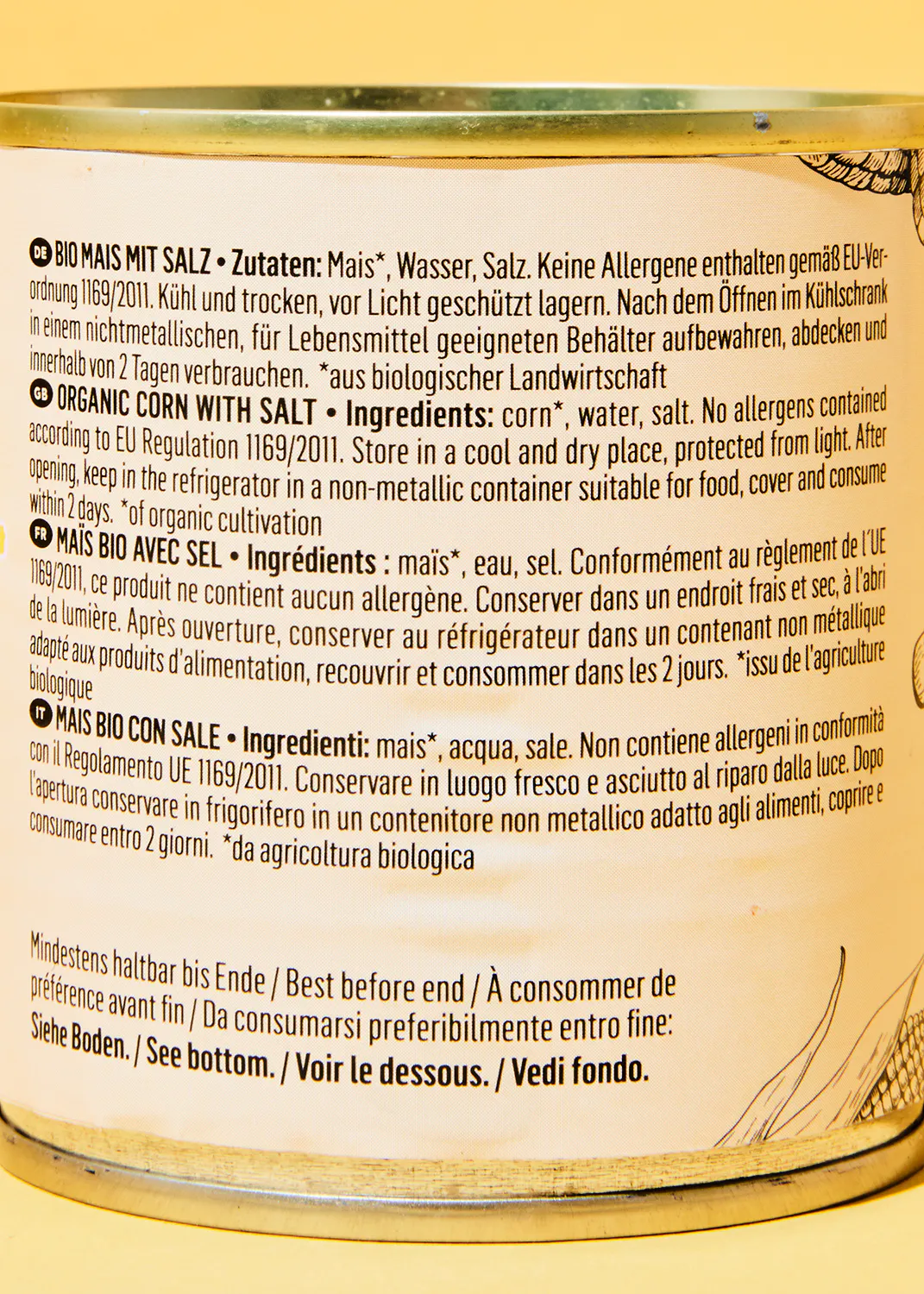 a close up of the back of a can of corn with salt