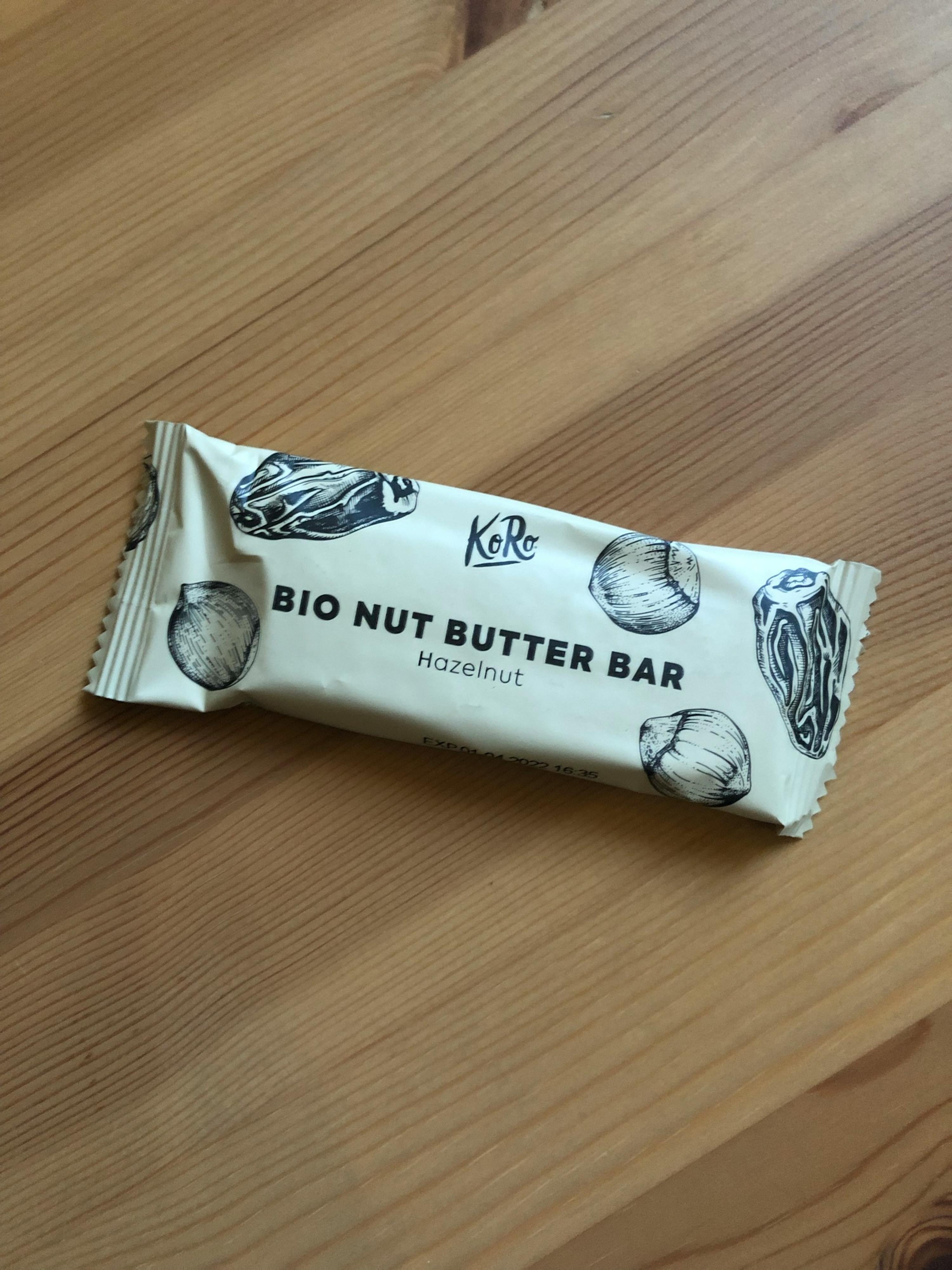 a bio nut butter bar is on a wooden table