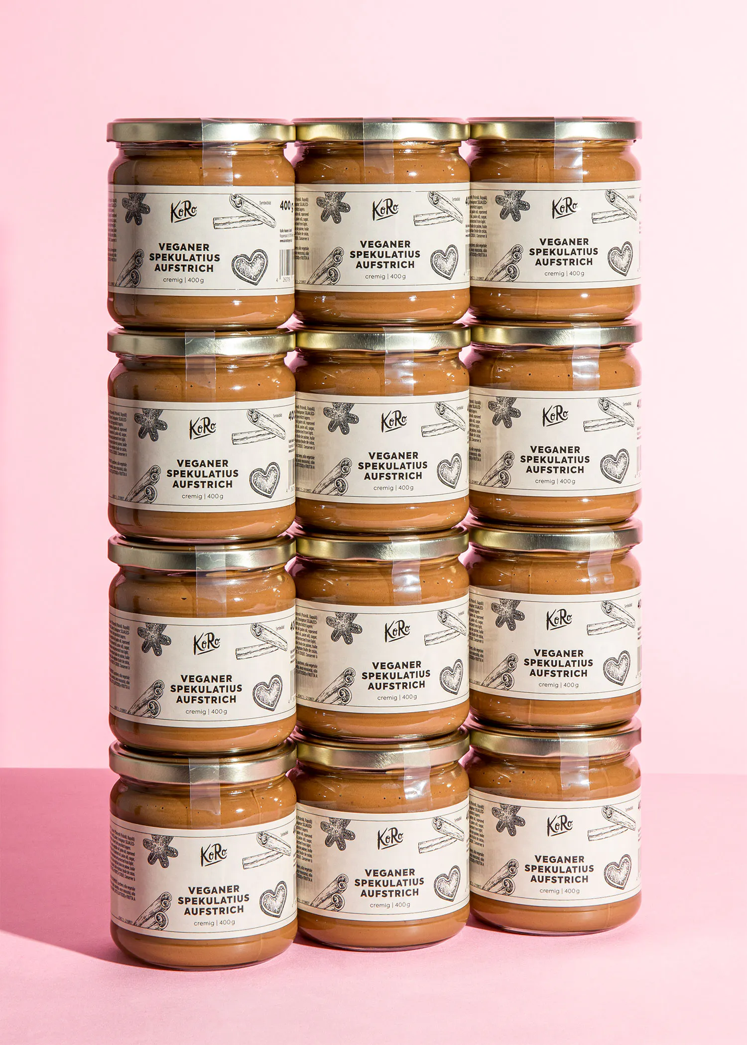 a stack of jars with labels that say veganer