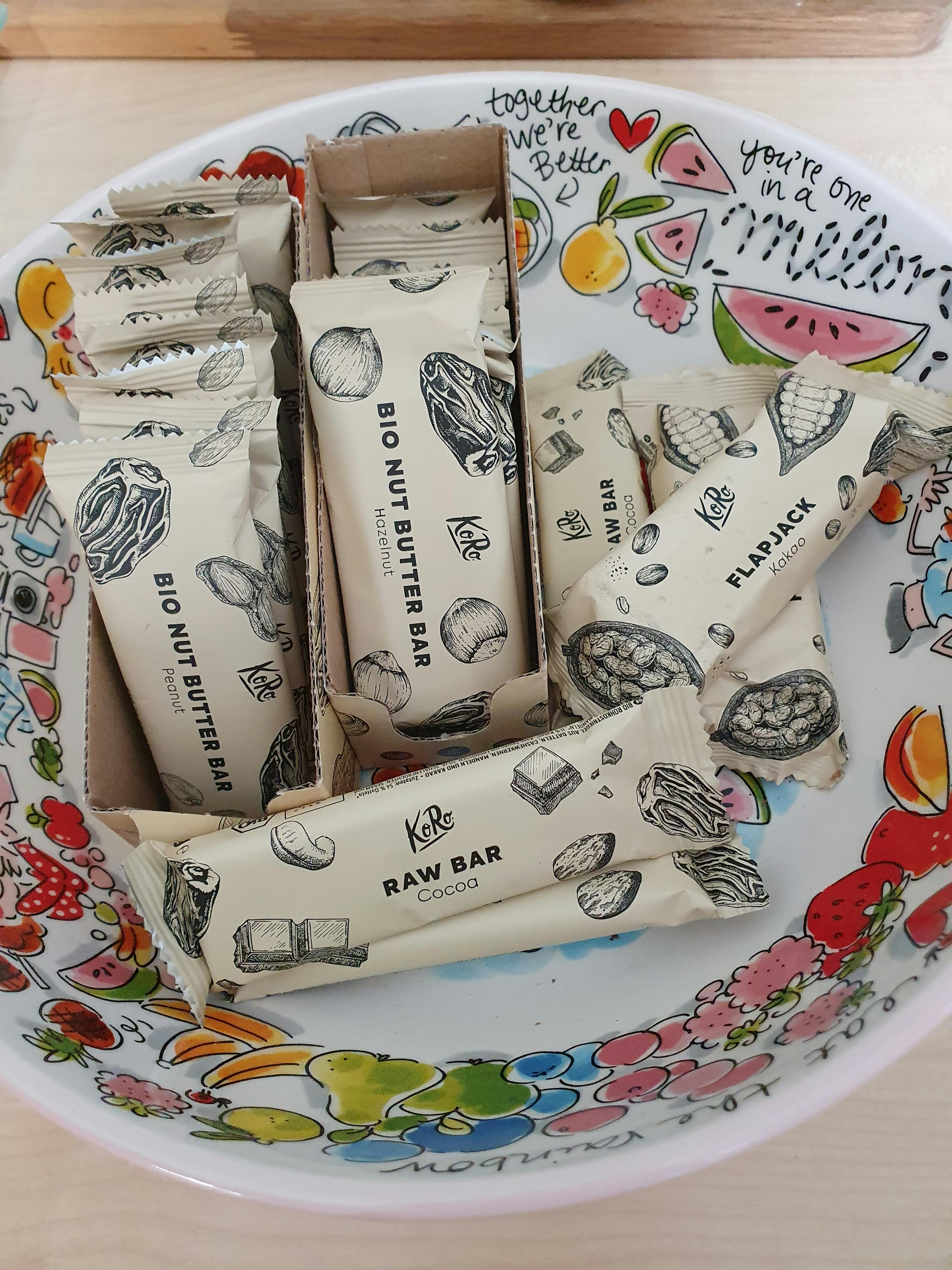 a box of bio nut butter bars in a bowl