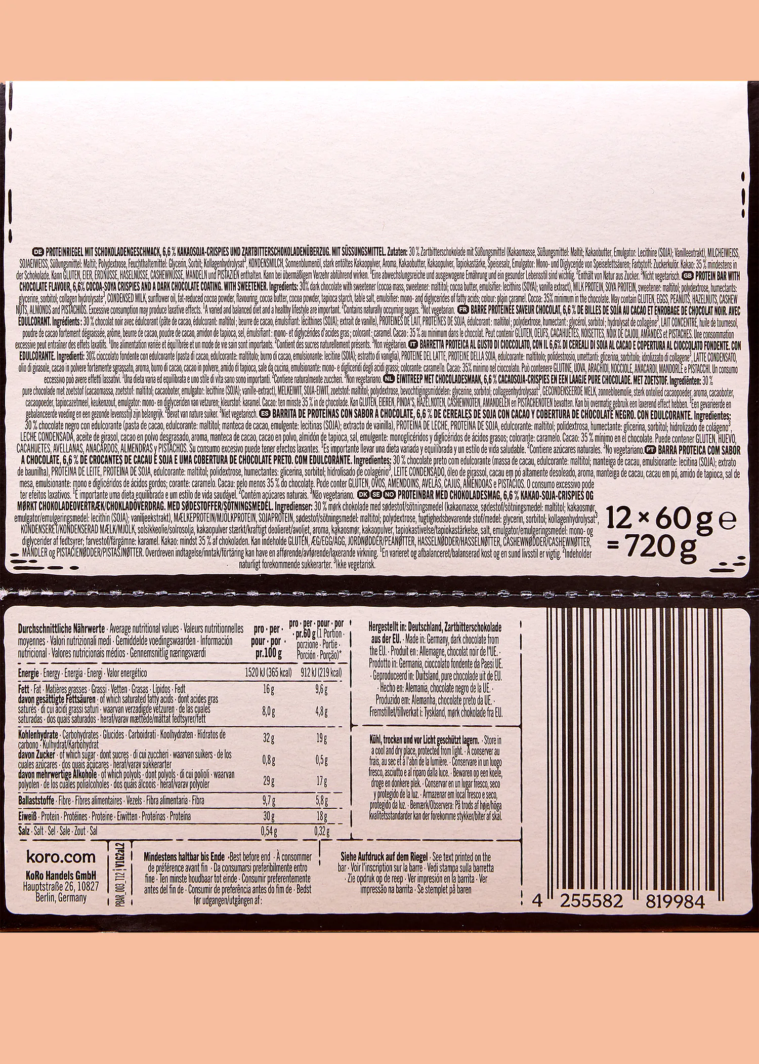 die rückseite einer koro proteinriegel-verpackung mit zutatenliste, nährwerttabelle und herstellerinformationen in mehreren sprachen.