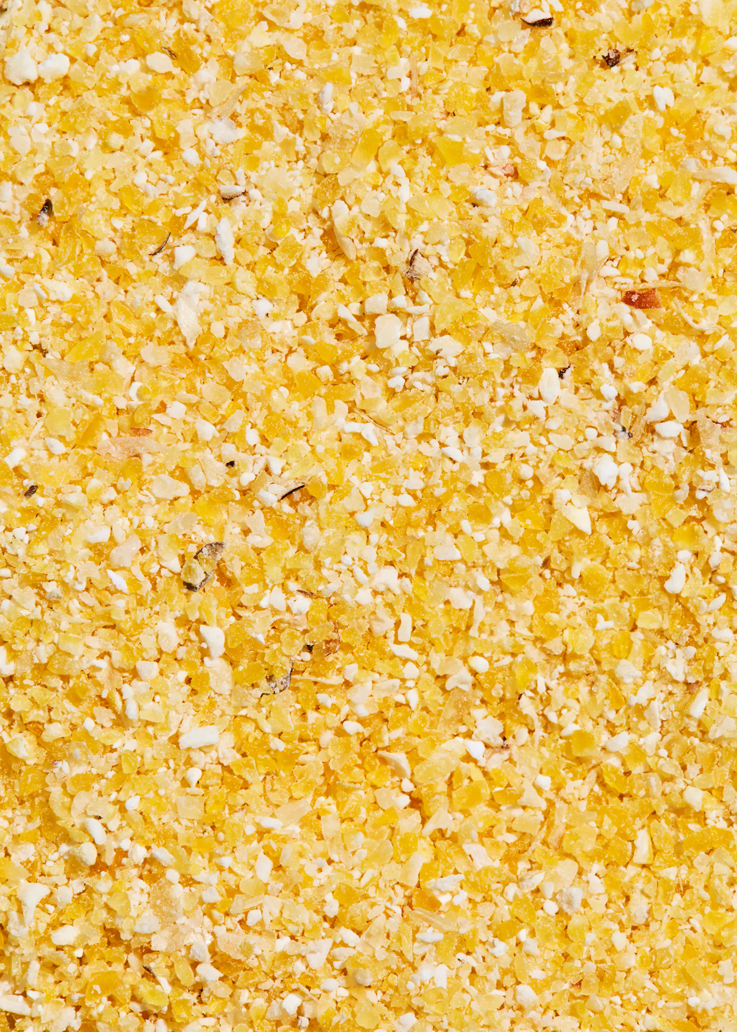 a close up of a pile of corn grits