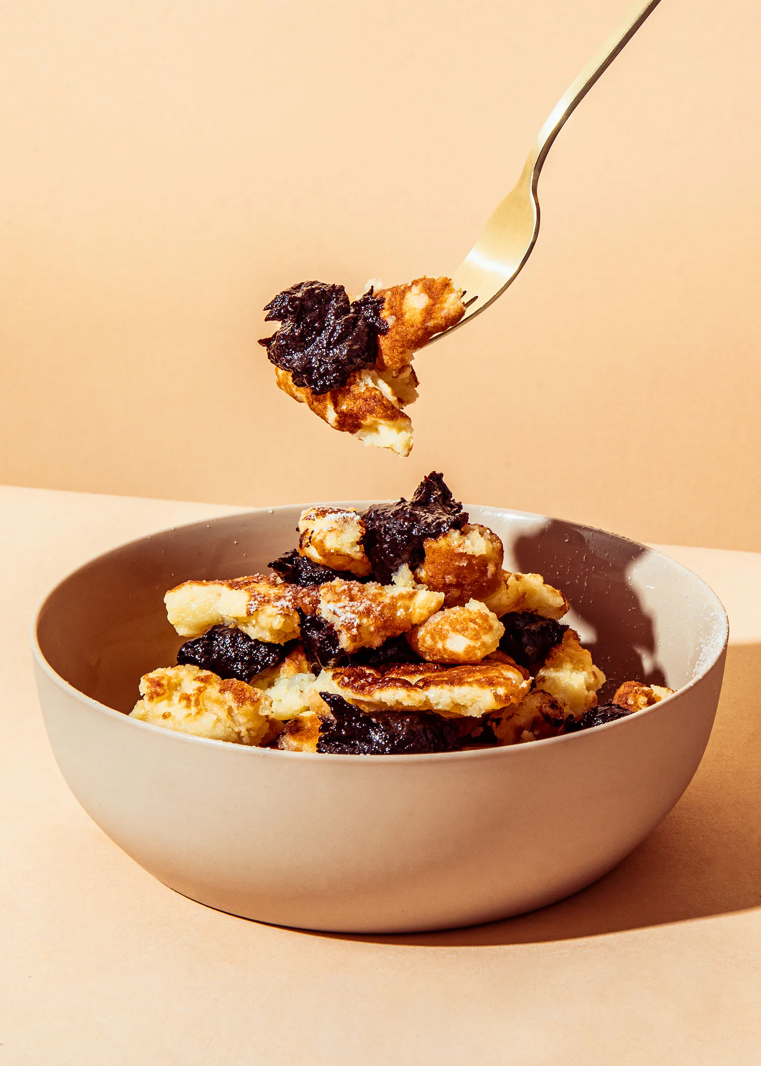 a bowl of food with a fork in it