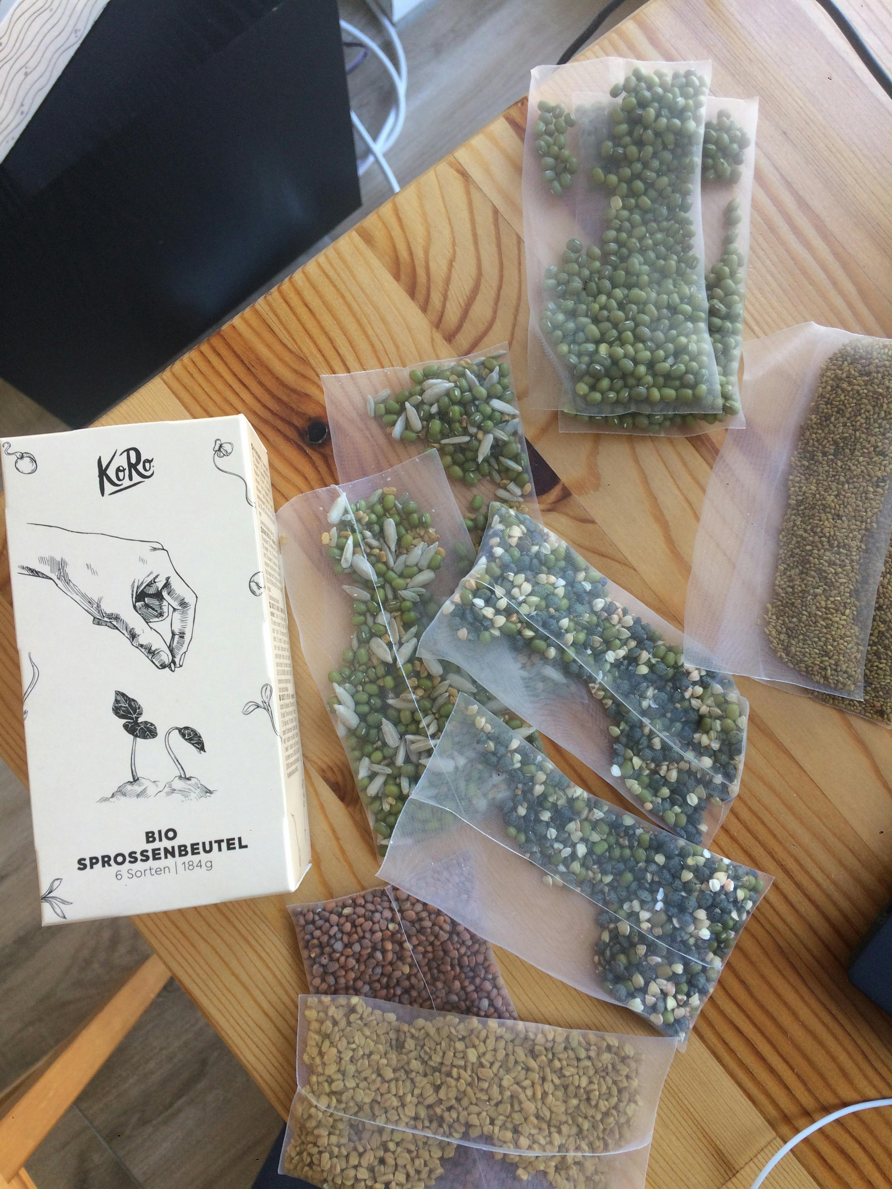 a box of bio sprossenbeutel is on a wooden table