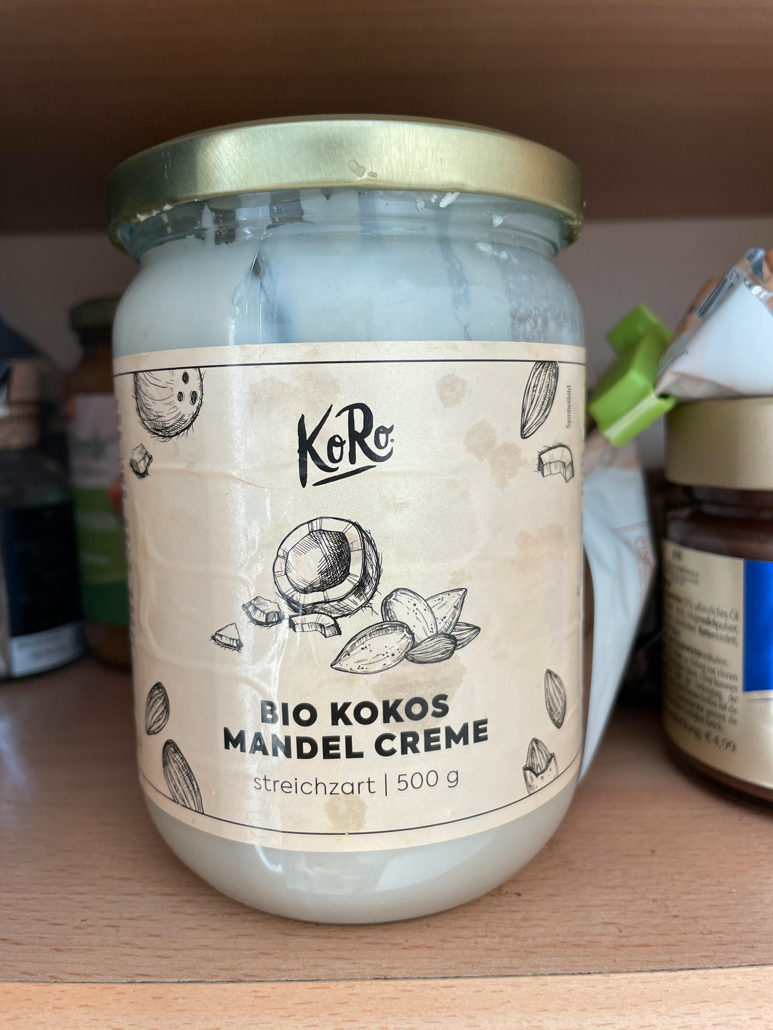 a jar of bio kokos mandel creme sits on a shelf
