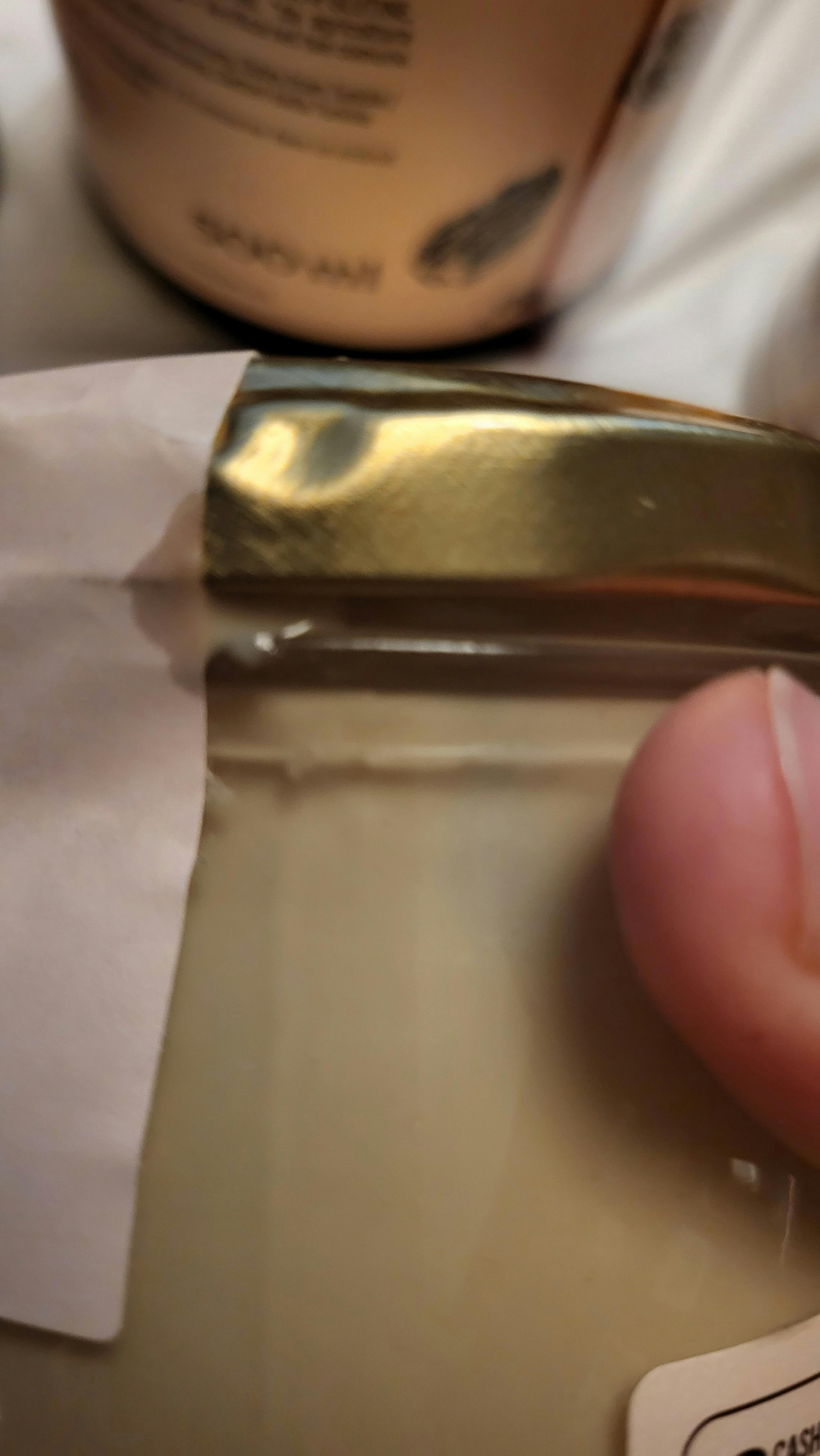 a close up of a bottle with a label that says ' sensitive ' on it