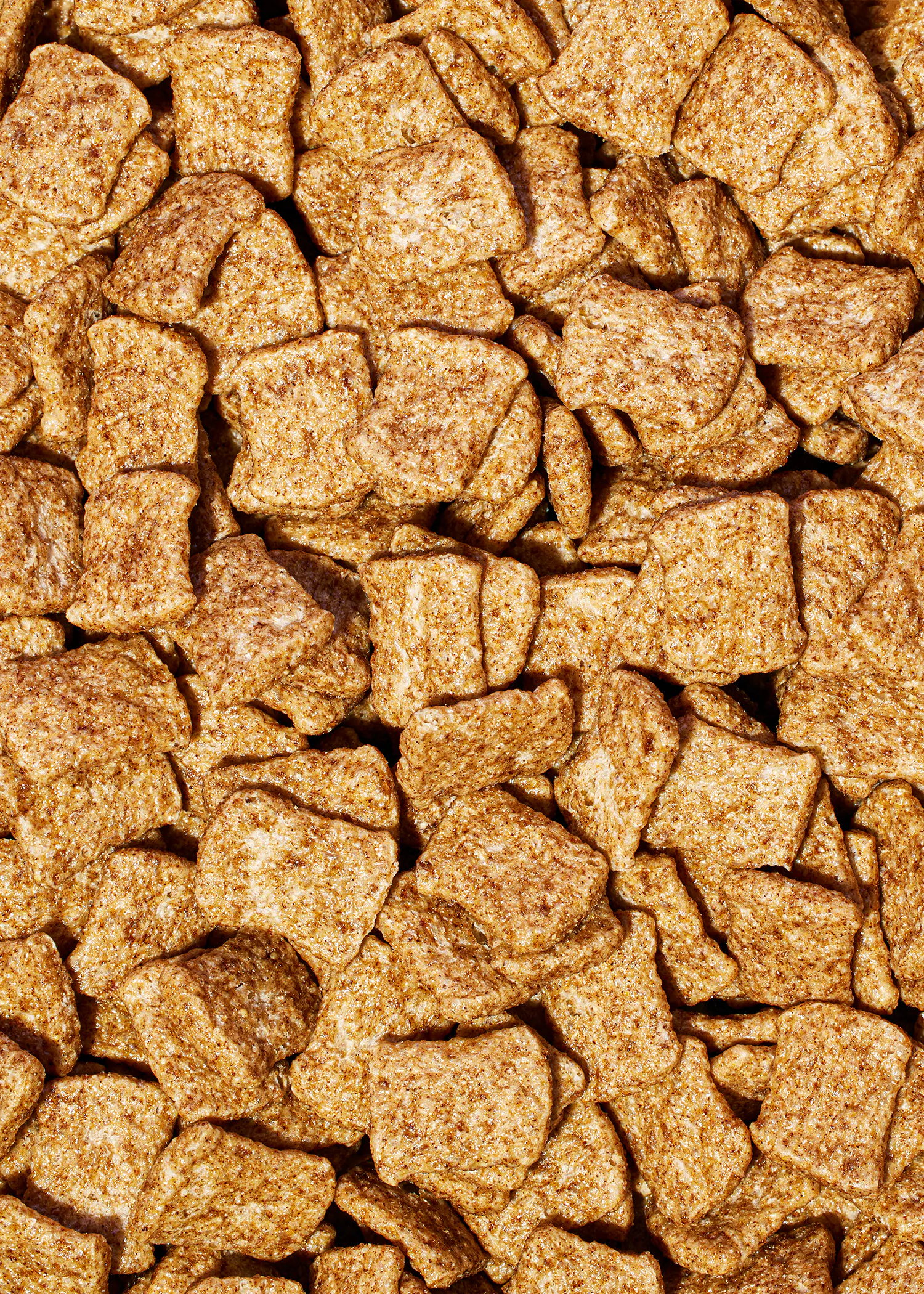 un gros plan d' une pile de céréales à la cannelle