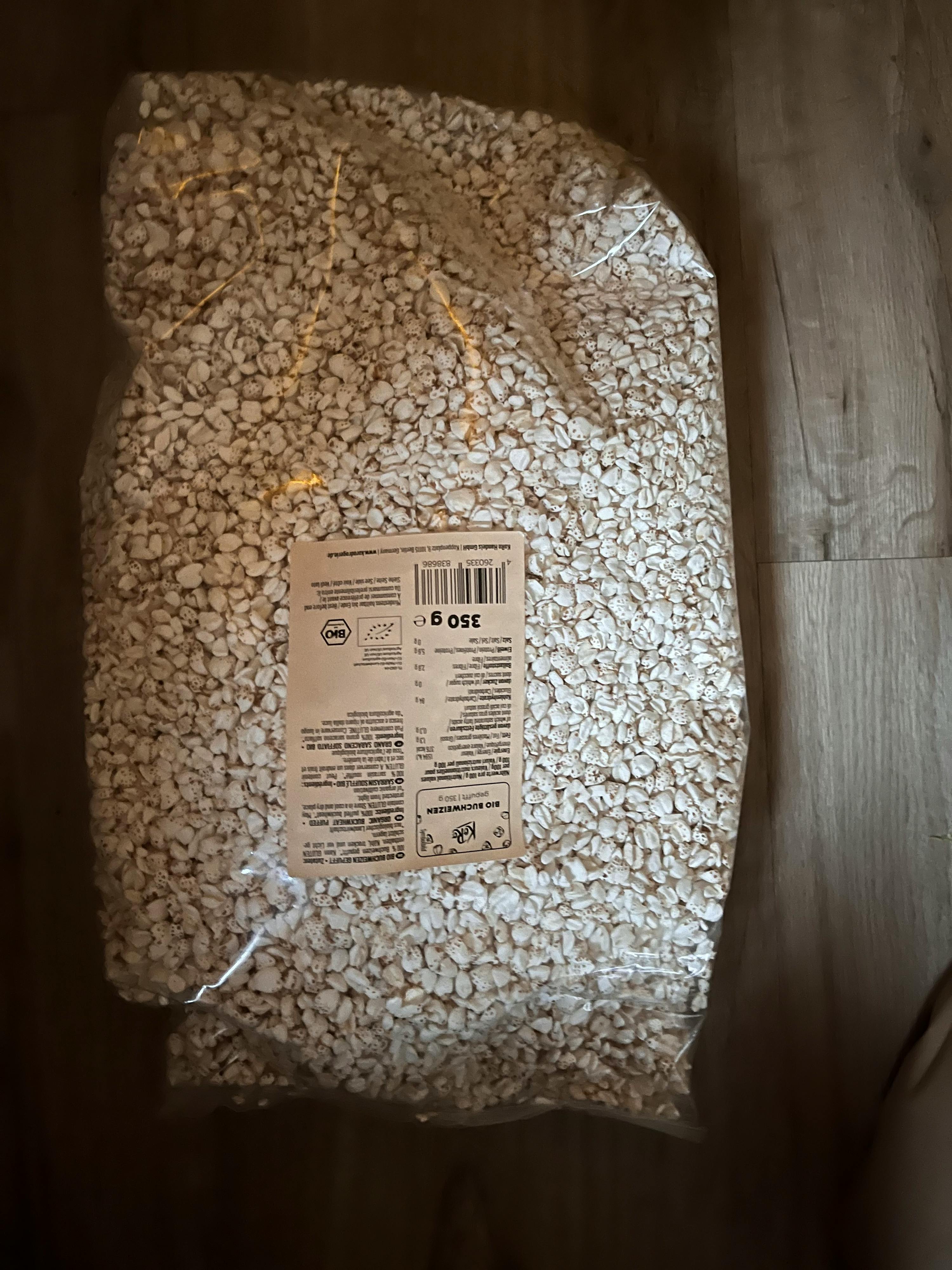 un sacchetto di ghiaia bianca con un etichetta che dice 350 g