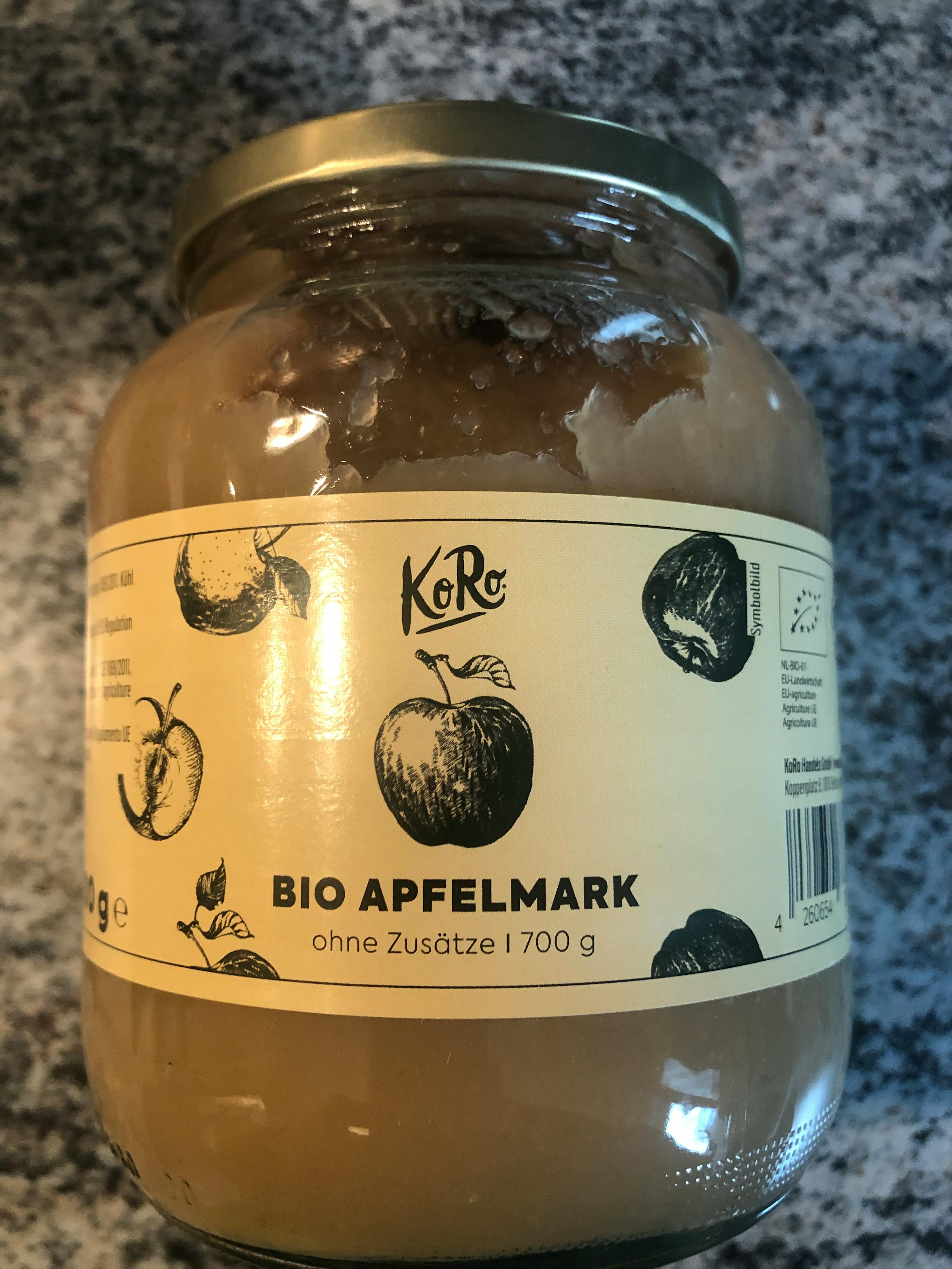 un barattolo di kero bio apfelmark è seduto su un tavolo di marmo