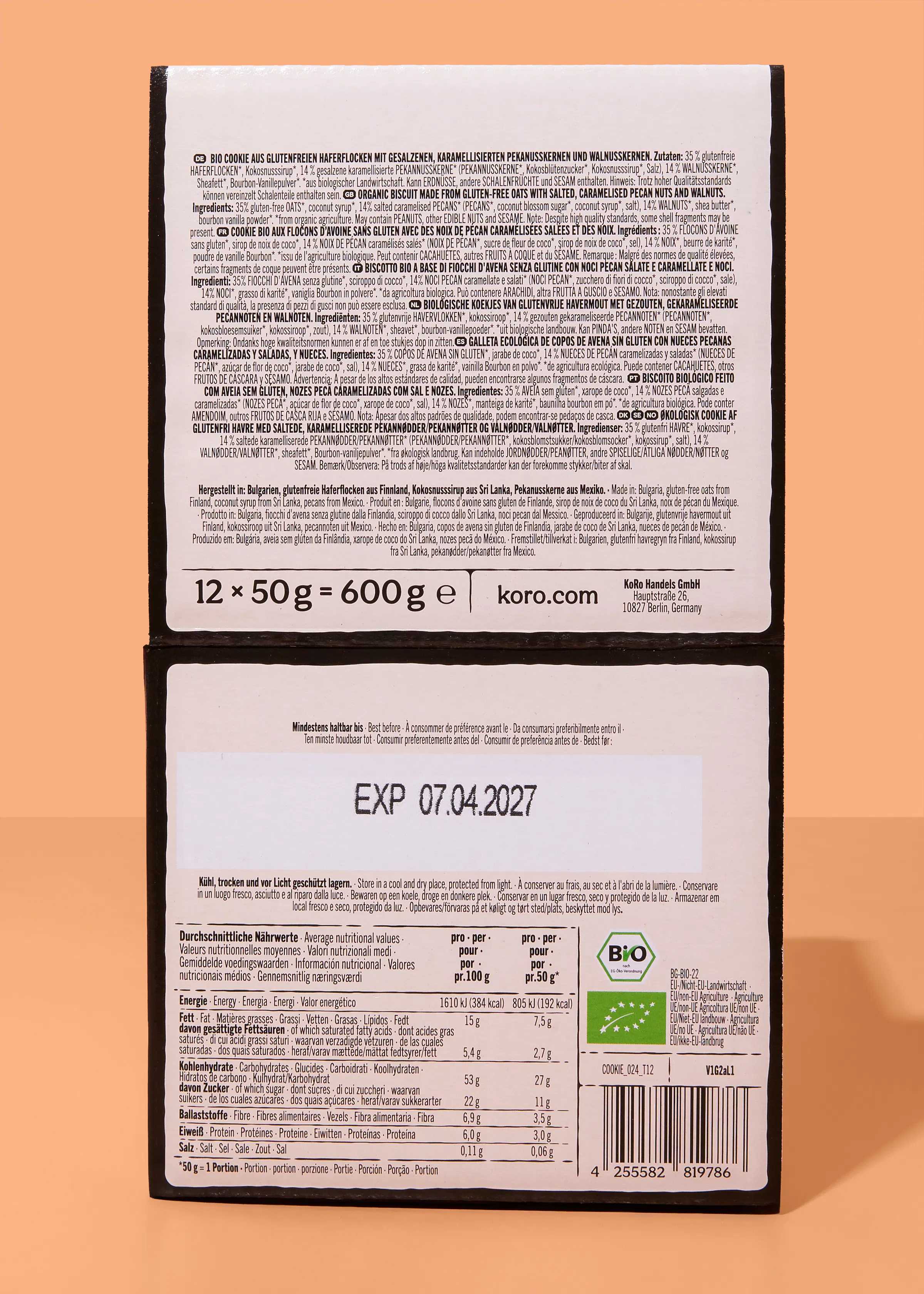 die rückseite einer koro-keksverpackung mit zutatenliste, nährwerttabelle, mindesthaltbarkeitsdatum und herstellerinformationen.