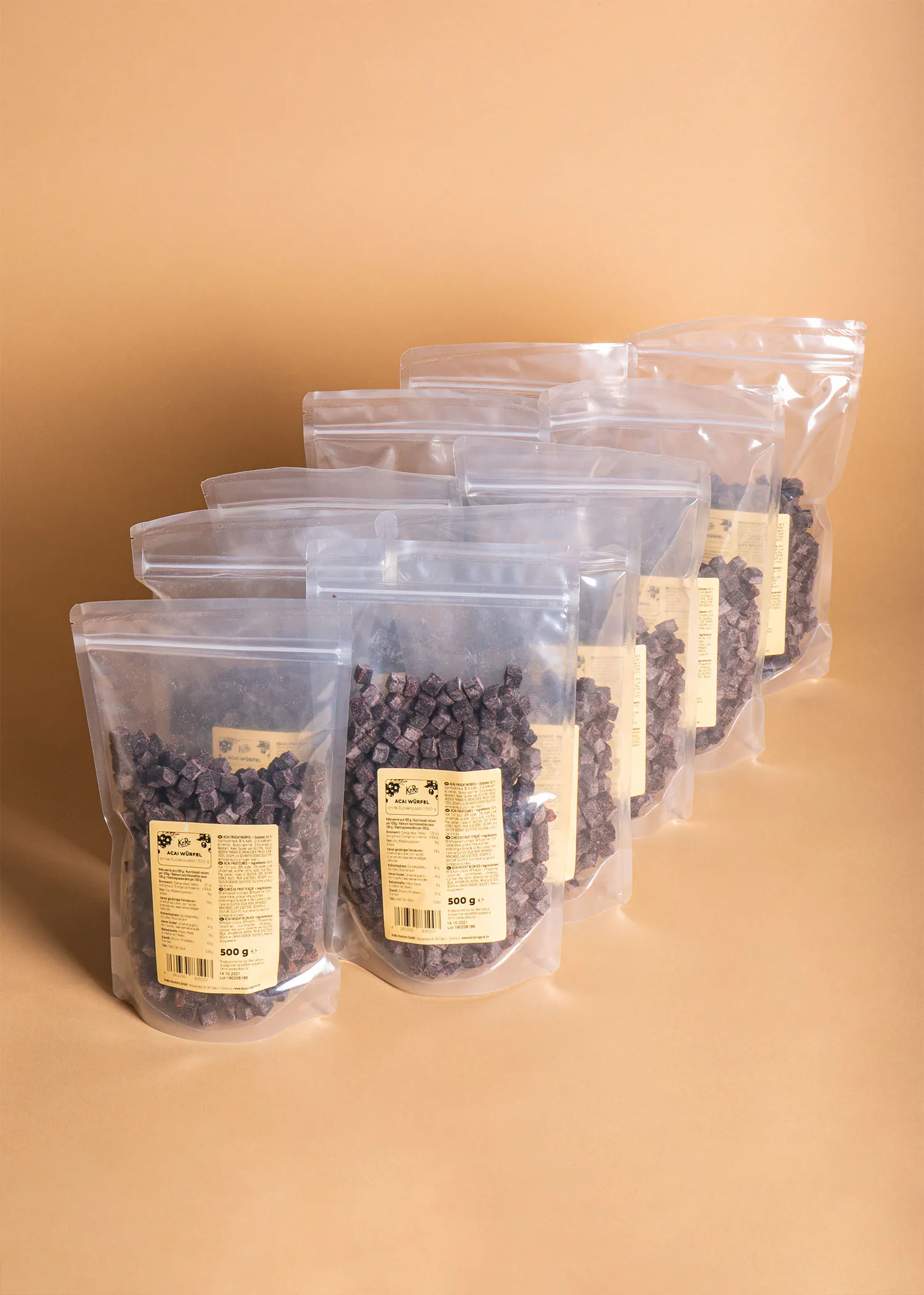 bags of chocolate chips are lined up in a row