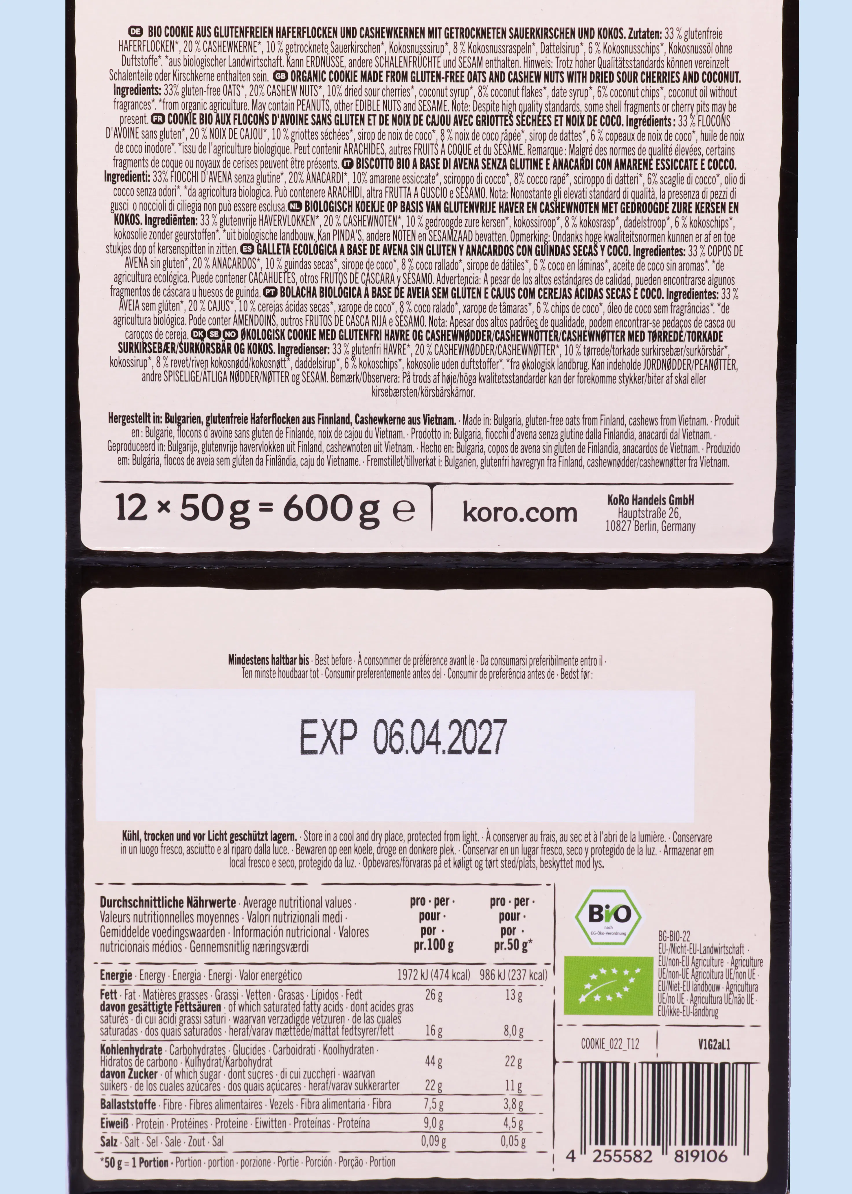 étiquette arrière d'un paquet de biscuits bio sans gluten aux flocons d'avoine, noix de cajou, cerises griottes et noix de coco, incluant la liste des ingrédients, les informations nutritionnelles et la date de péremption.