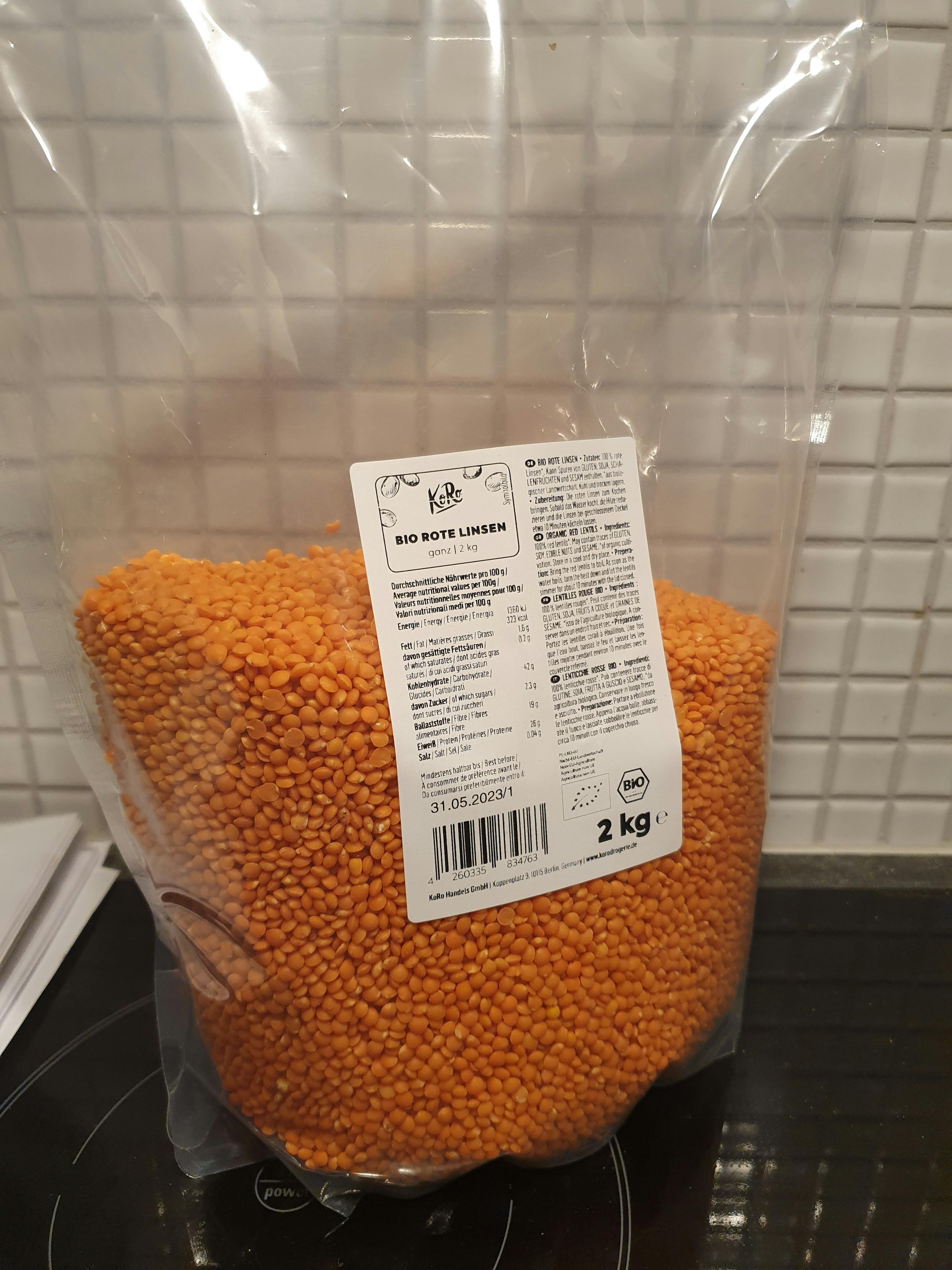 a bag of red lentils is on a stove top