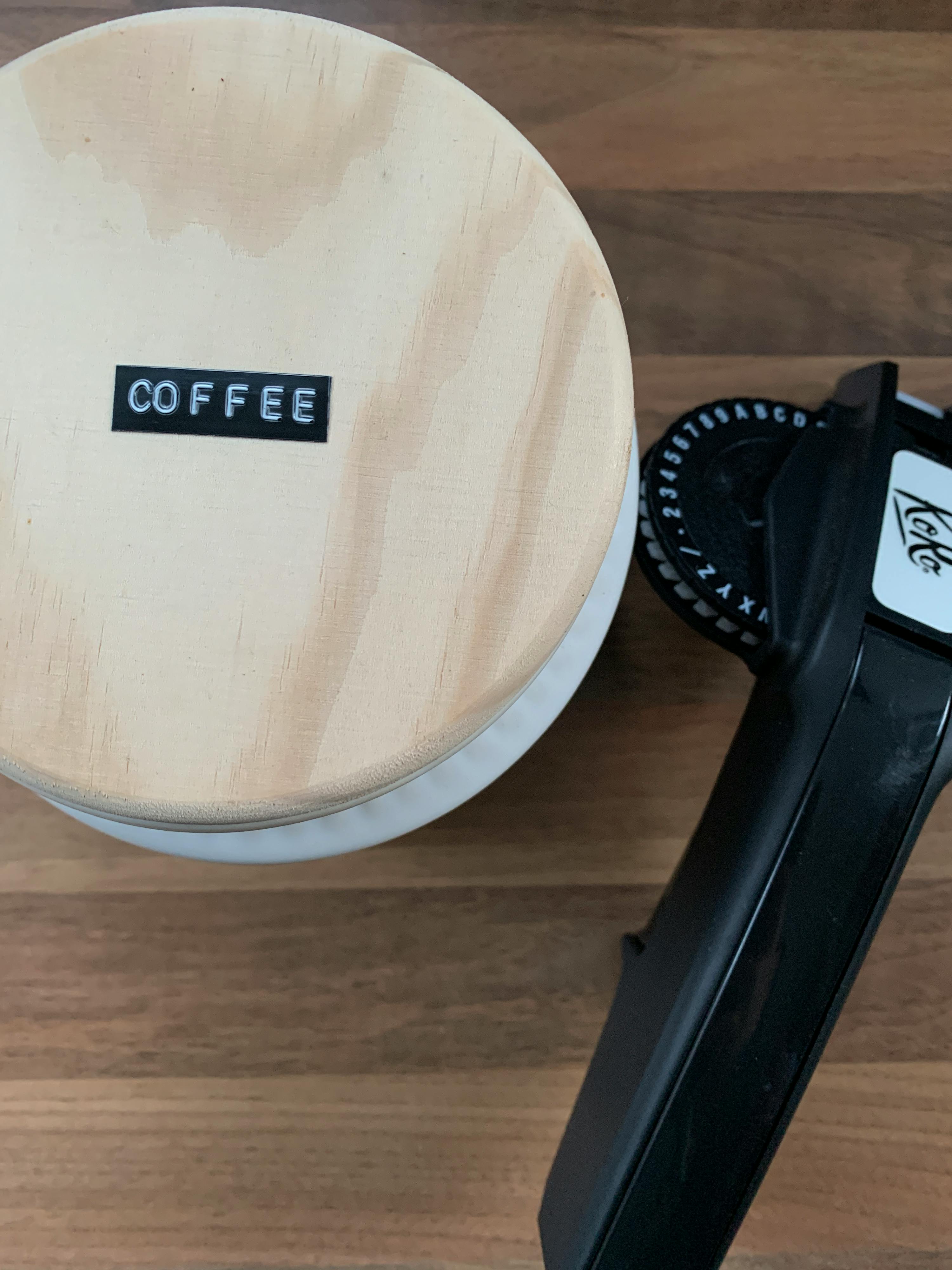 a wooden container with the word coffee written on it