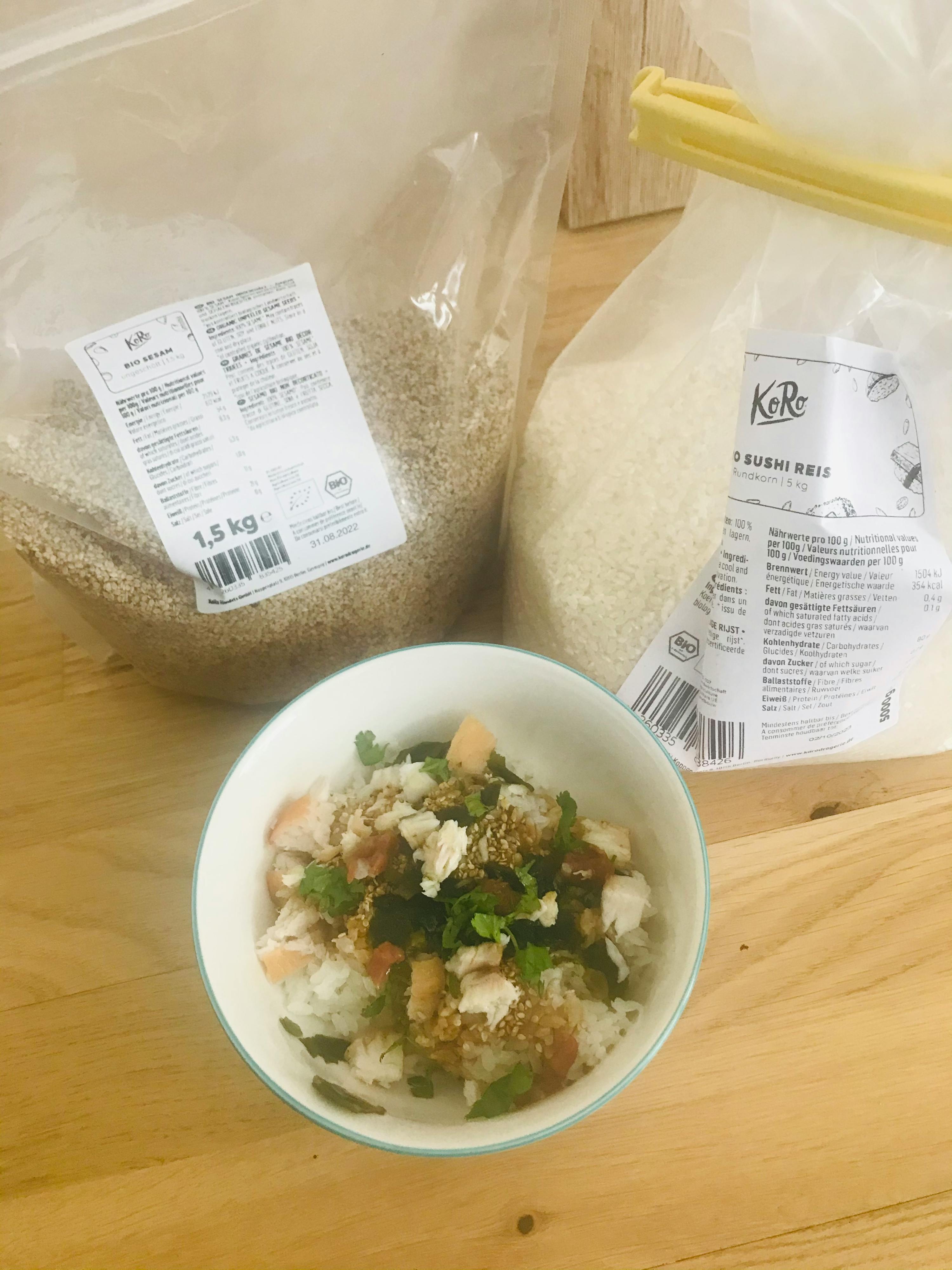 a bag of sushi rice next to a bowl of food