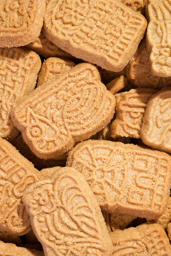 a close up of a pile of lotus cookies