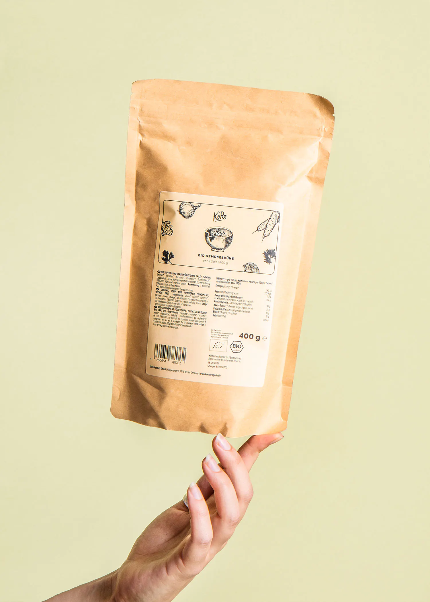 a person is holding up a bag of food that says bio