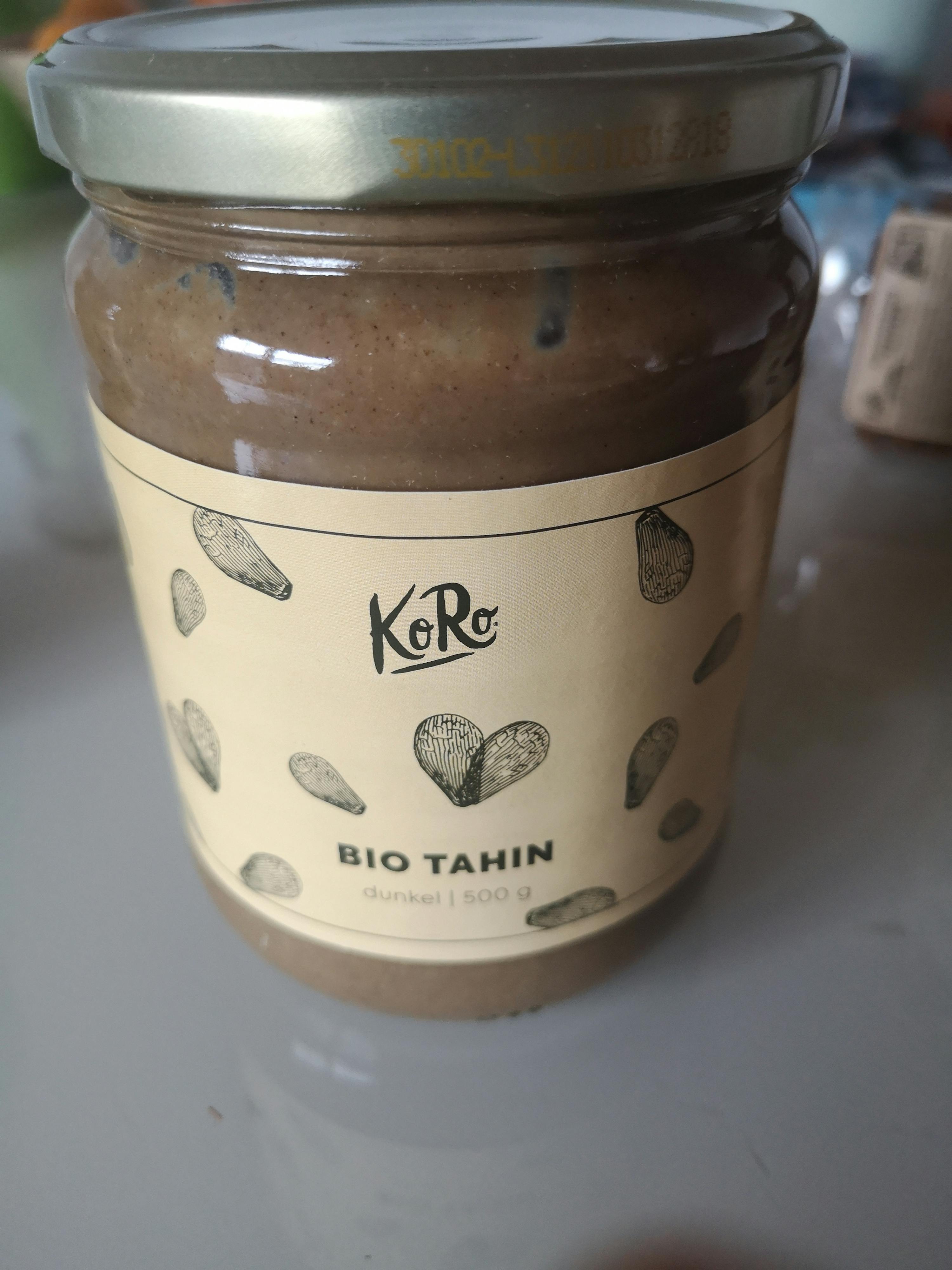 a jar of bio tahin is sitting on a counter