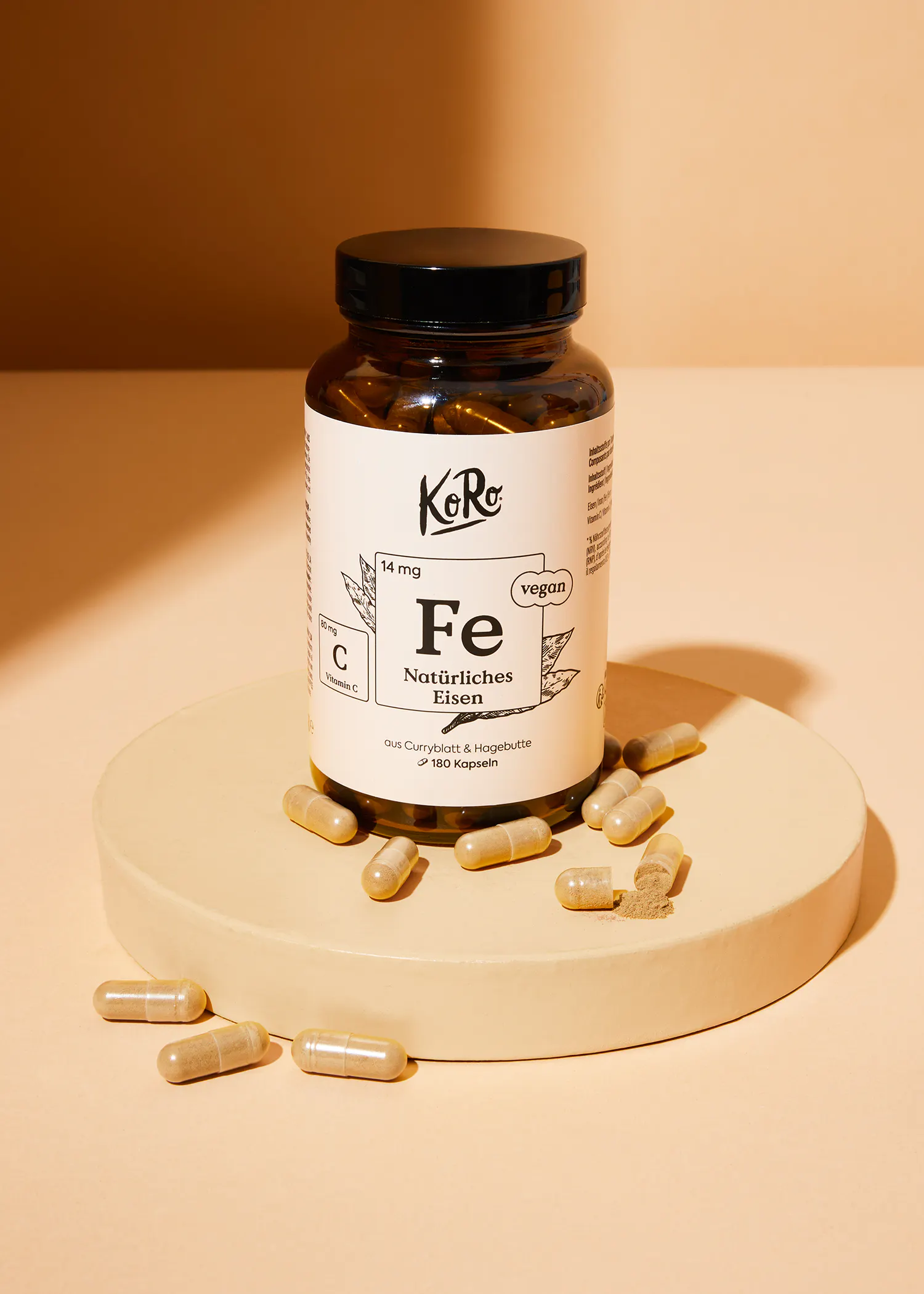 a bottle of capsules that says fe on it