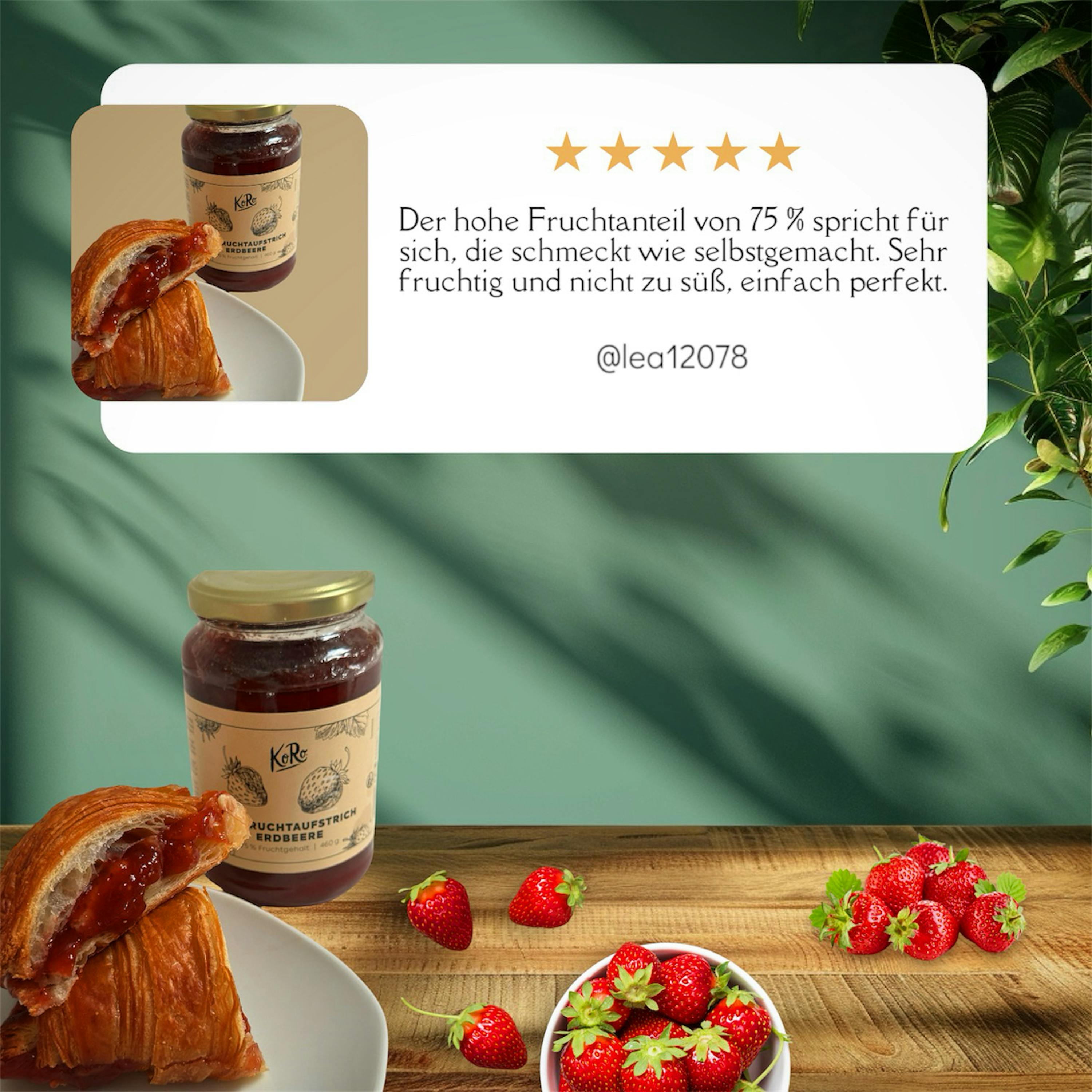 a jar of strawberry jam next to a croissant and strawberries