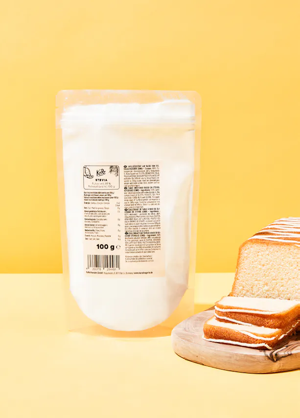 a bag of cake mix sits next to a loaf of bread