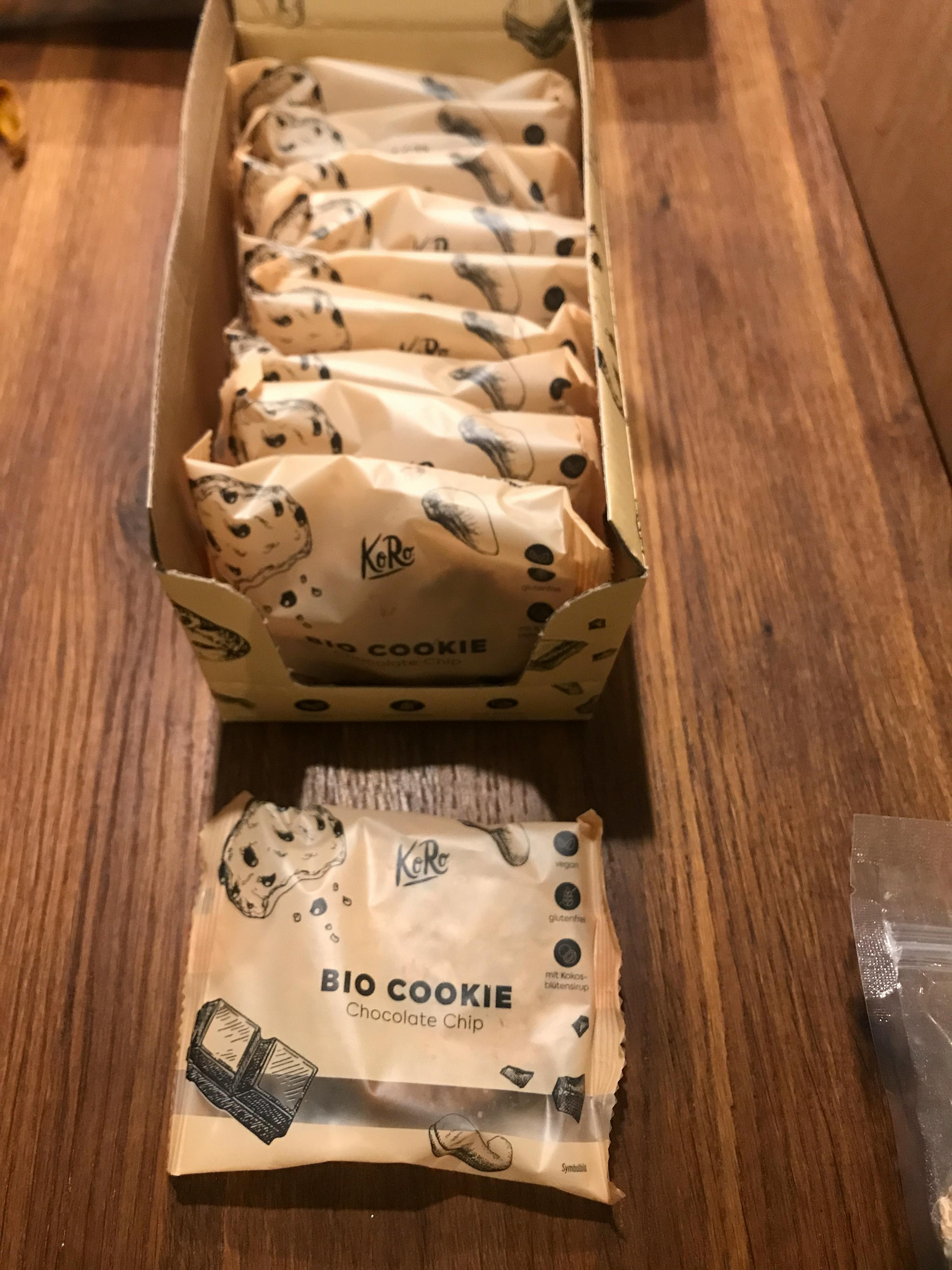 a box of bio cookie chocolate chip cookies on a wooden table