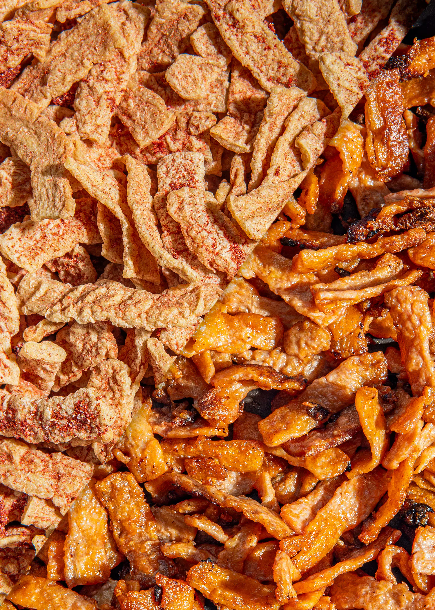 a close up of a pile of fried food with a few different flavors