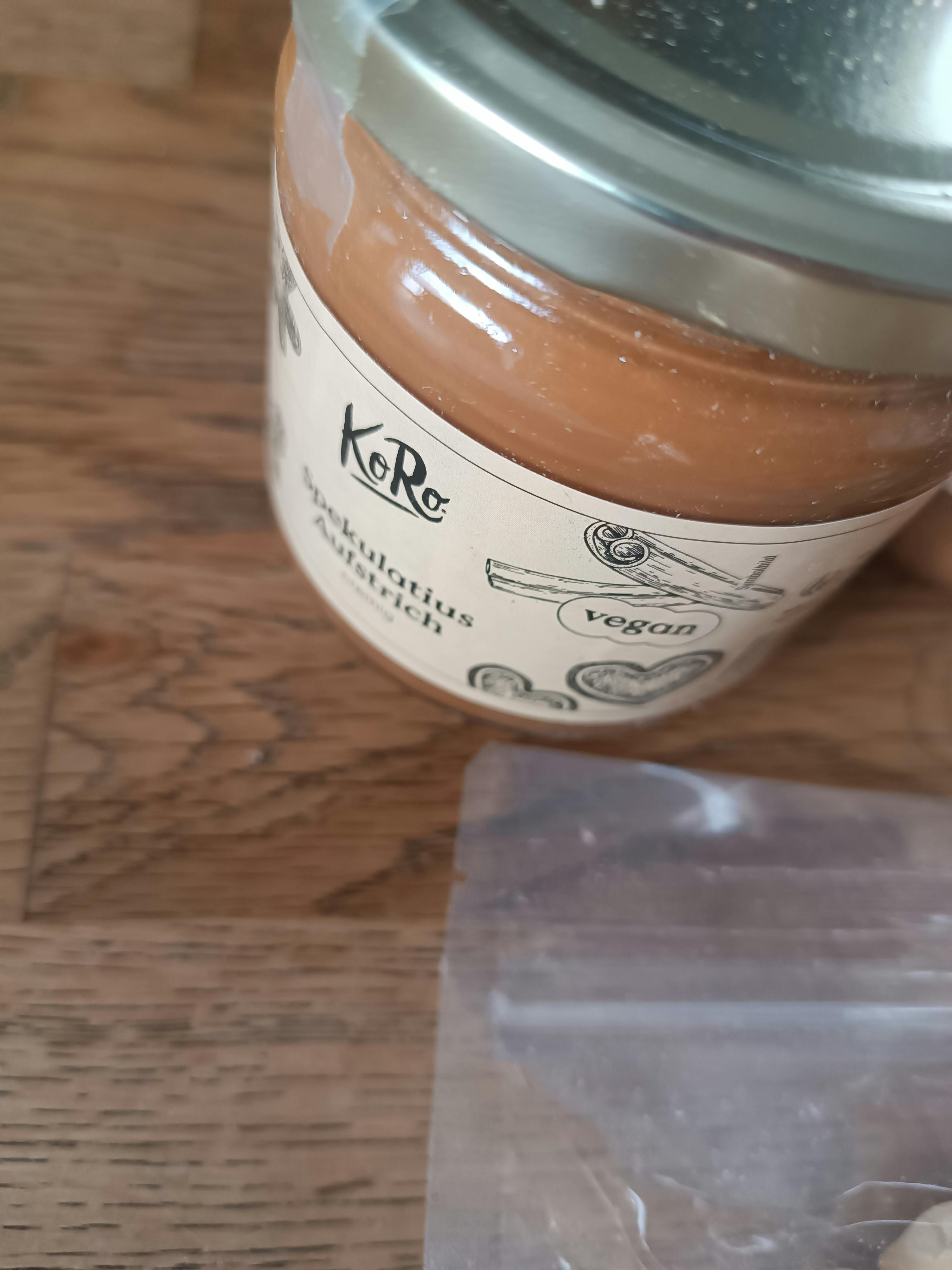 a jar of peanut butter with a label that says " vegan "