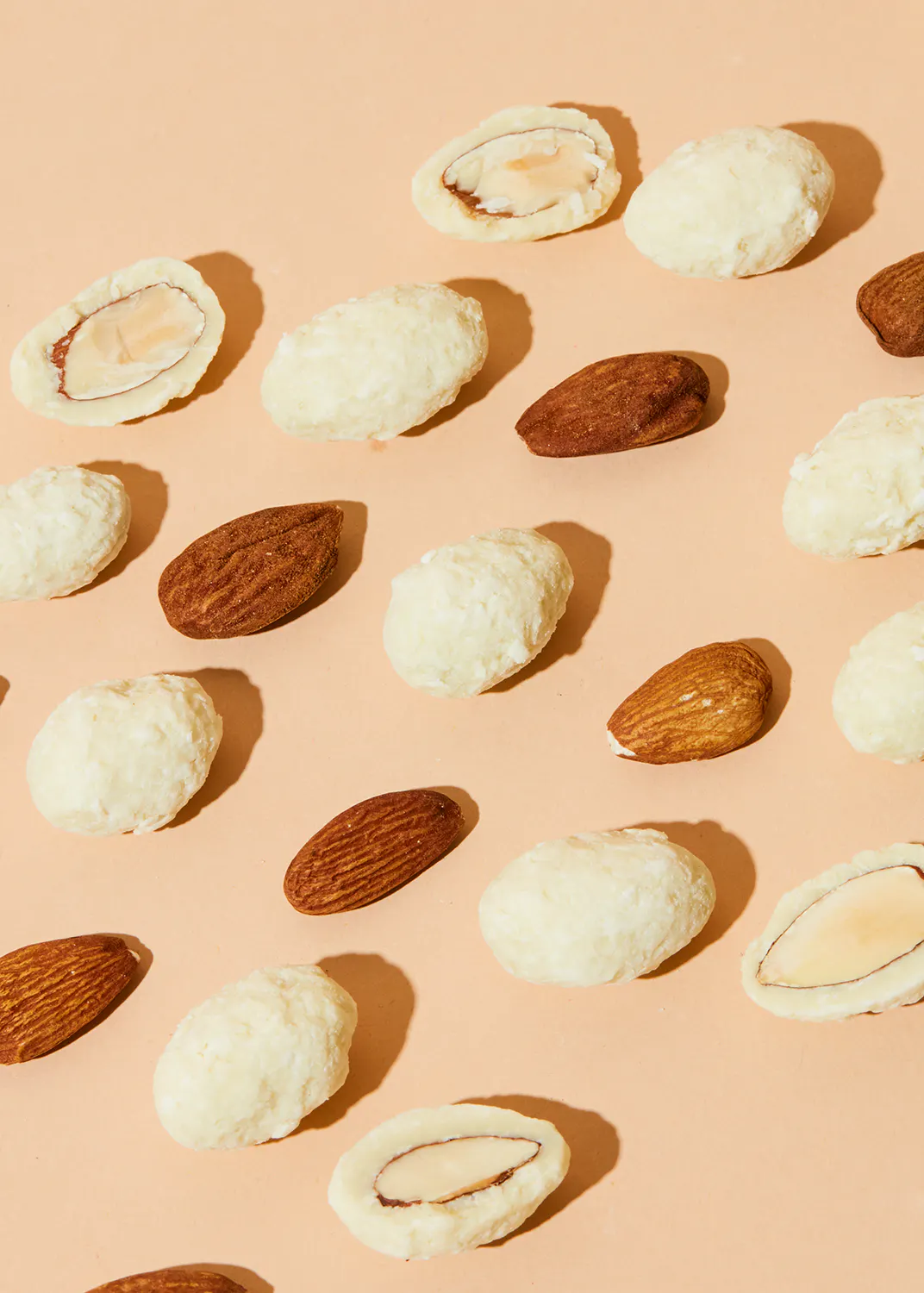 different types of almonds are lined up on a table