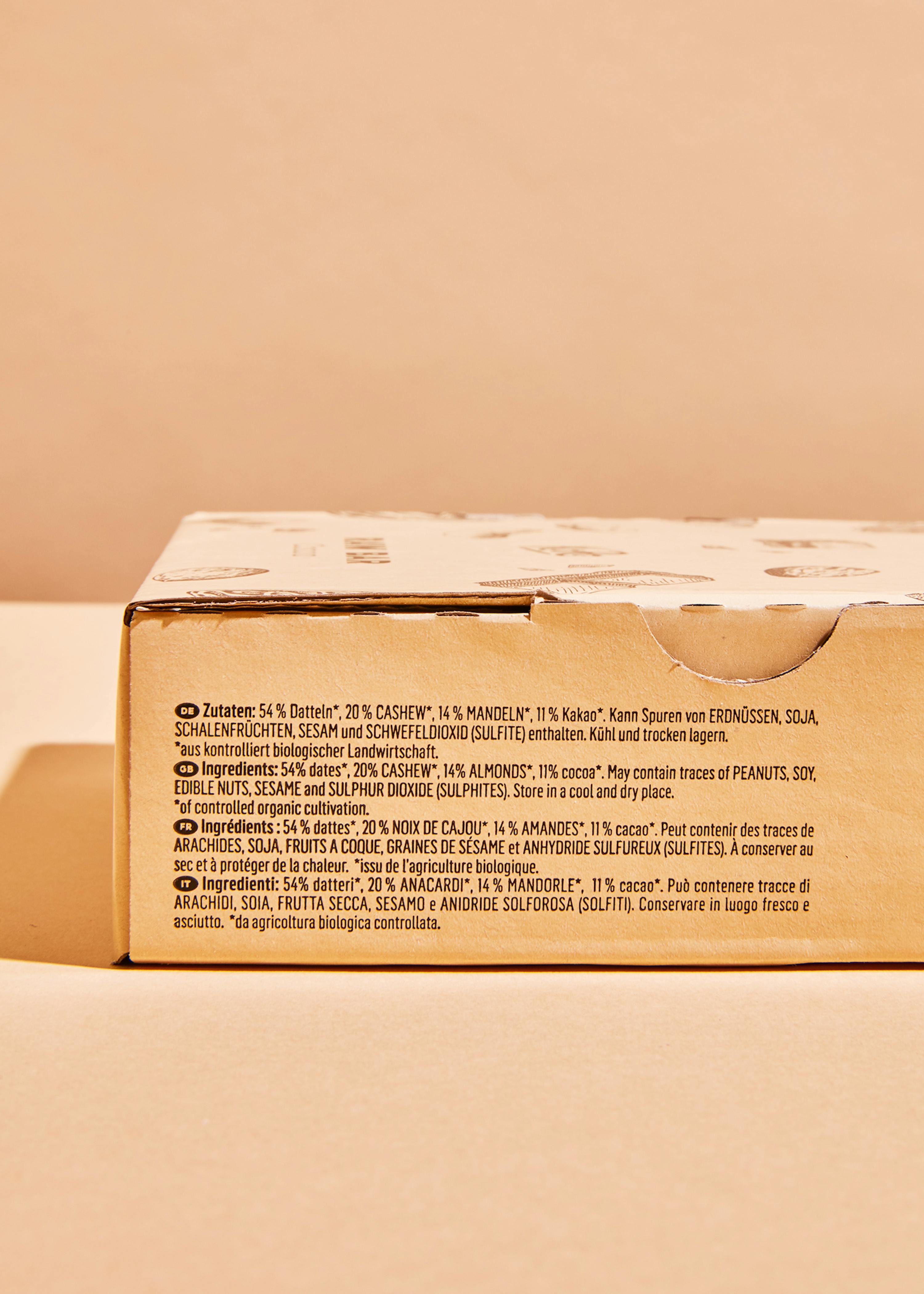 the back of a cardboard box contains ingredients such as cashew nuts sesame and selenium dioxide