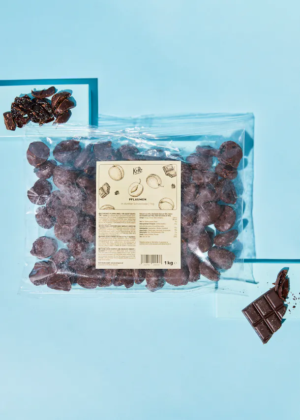a bag of chocolate covered pecans with a label that says " kitte " on it