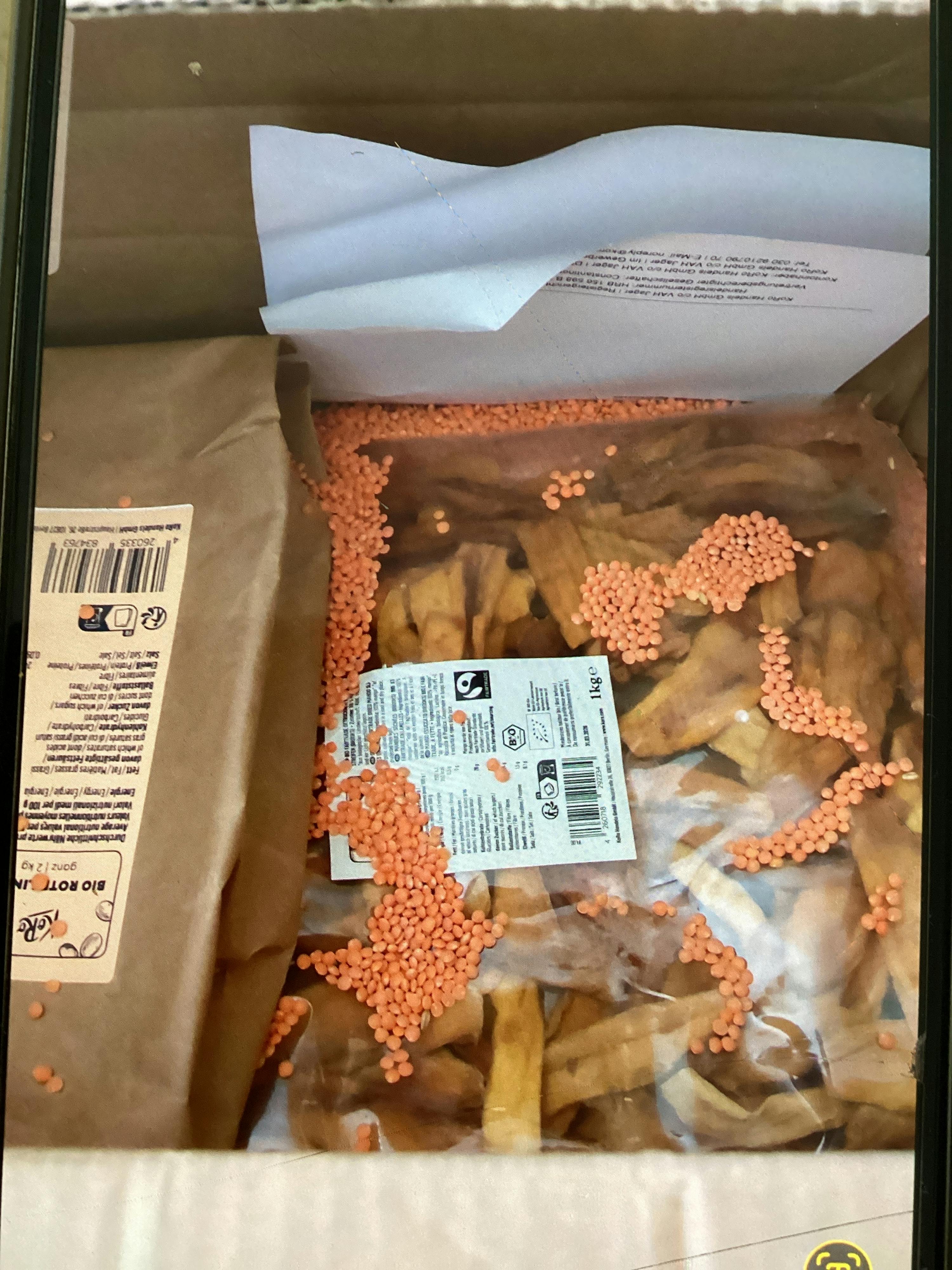 a bag of red lentils is in a box