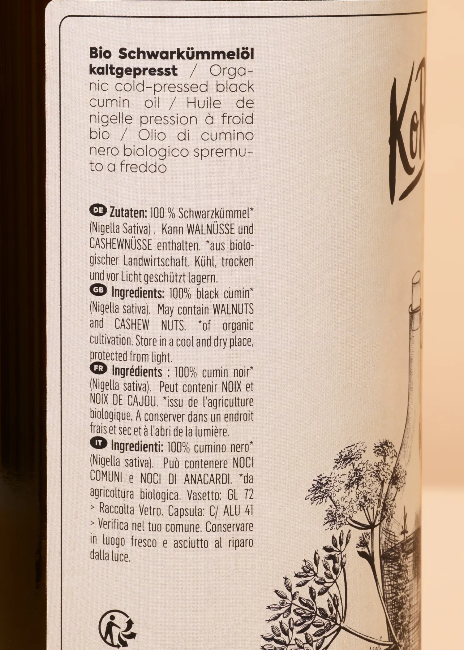 die rückseite einer flasche bio schwarzkümmelöl