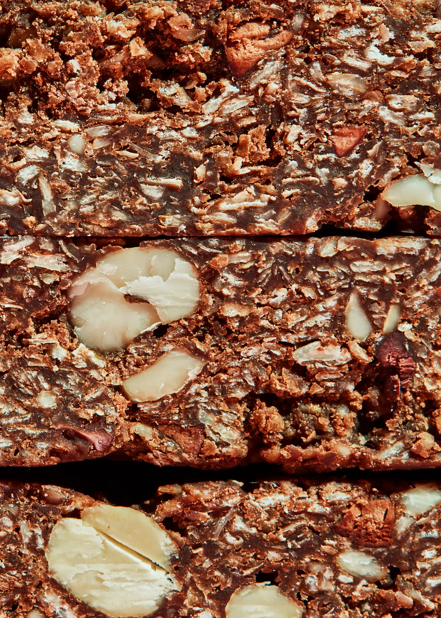 a close up of a chocolate bar with nuts in it