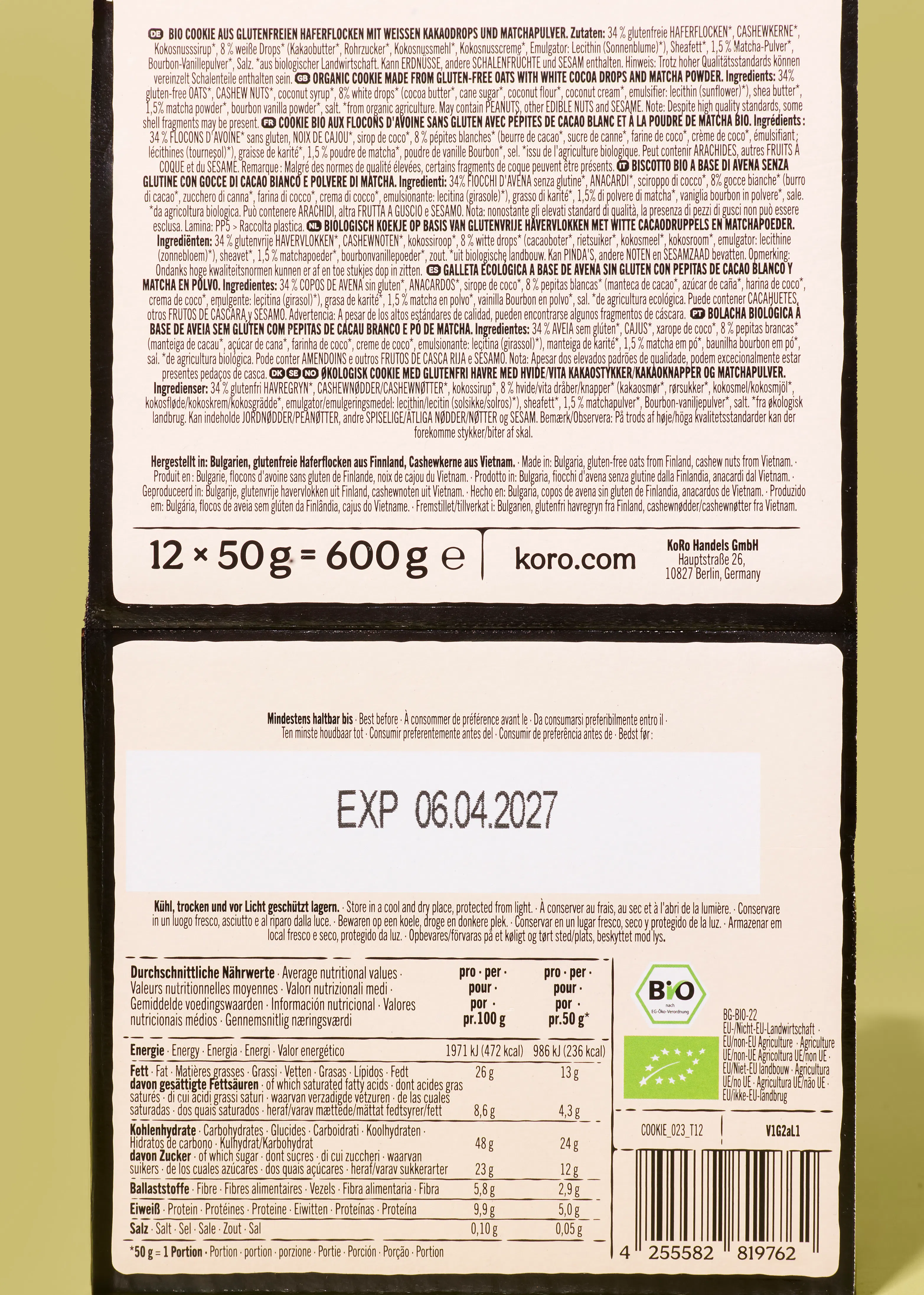 rückseite einer koro-keksverpackung mit zutatenliste, nährwerttabelle, mindesthaltbarkeitsdatum und herstellerinformationen.